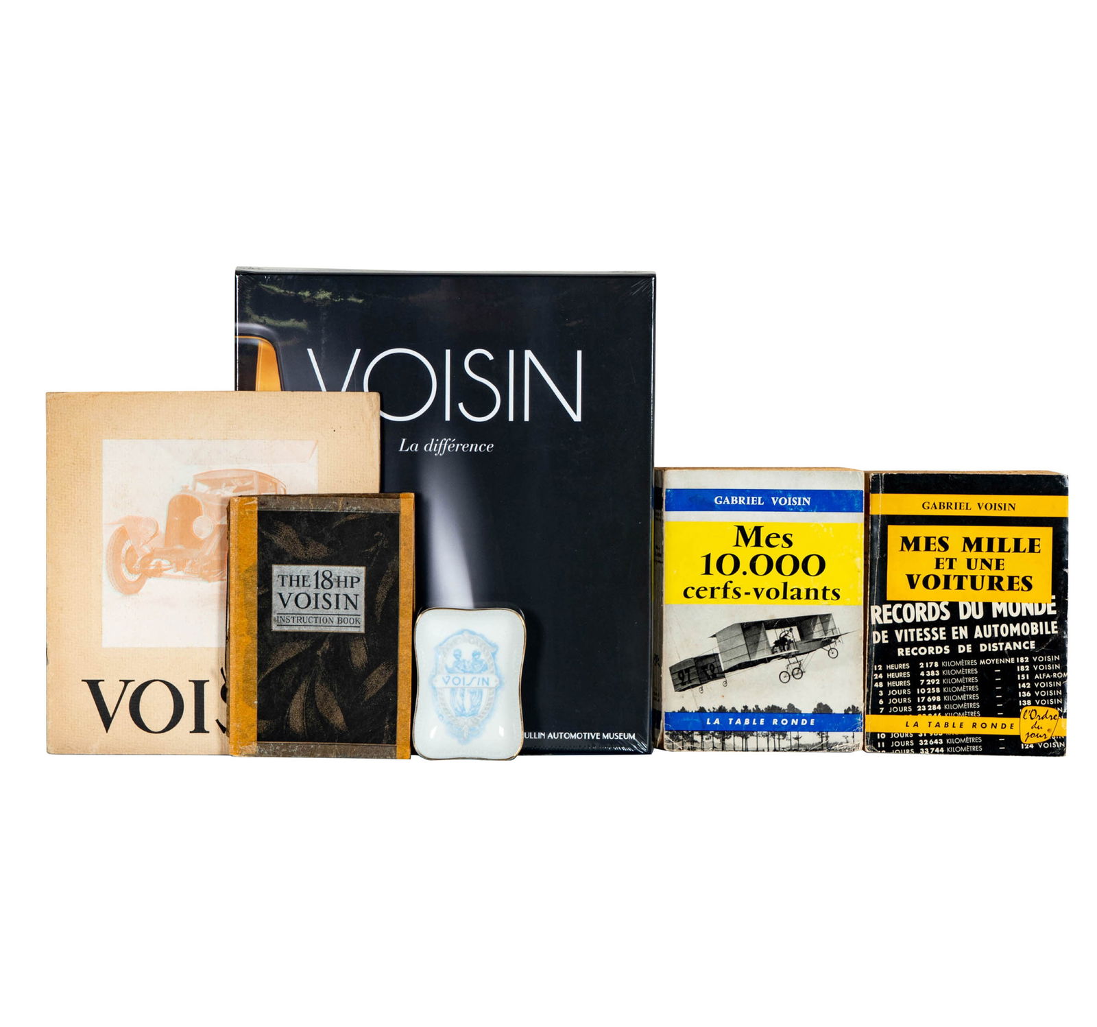 Group of Voisin Items: including one coffee table book, one ash tray, one pamphlet, two books and one manual, The ashtray: 4.25 x 3 x .75 in. 