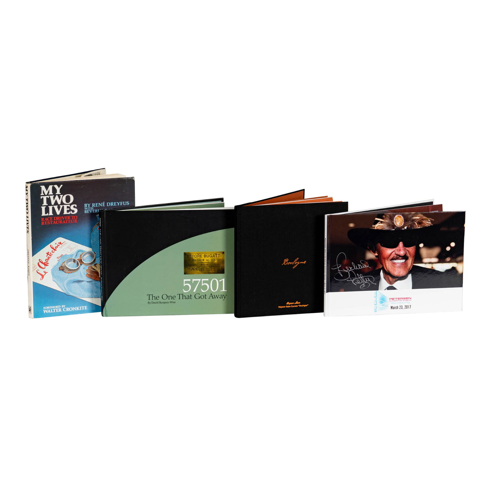 Four Signed Automotive Books: including books signed by Richard Petty, Miguel Suque Mateu (The then President of Hispano Suiza), The Honorable Sir Michael Kadoorie and Rene Dreyfus, Rene Dreyfus book: 11.25 x 8.75 x .75 in. 
