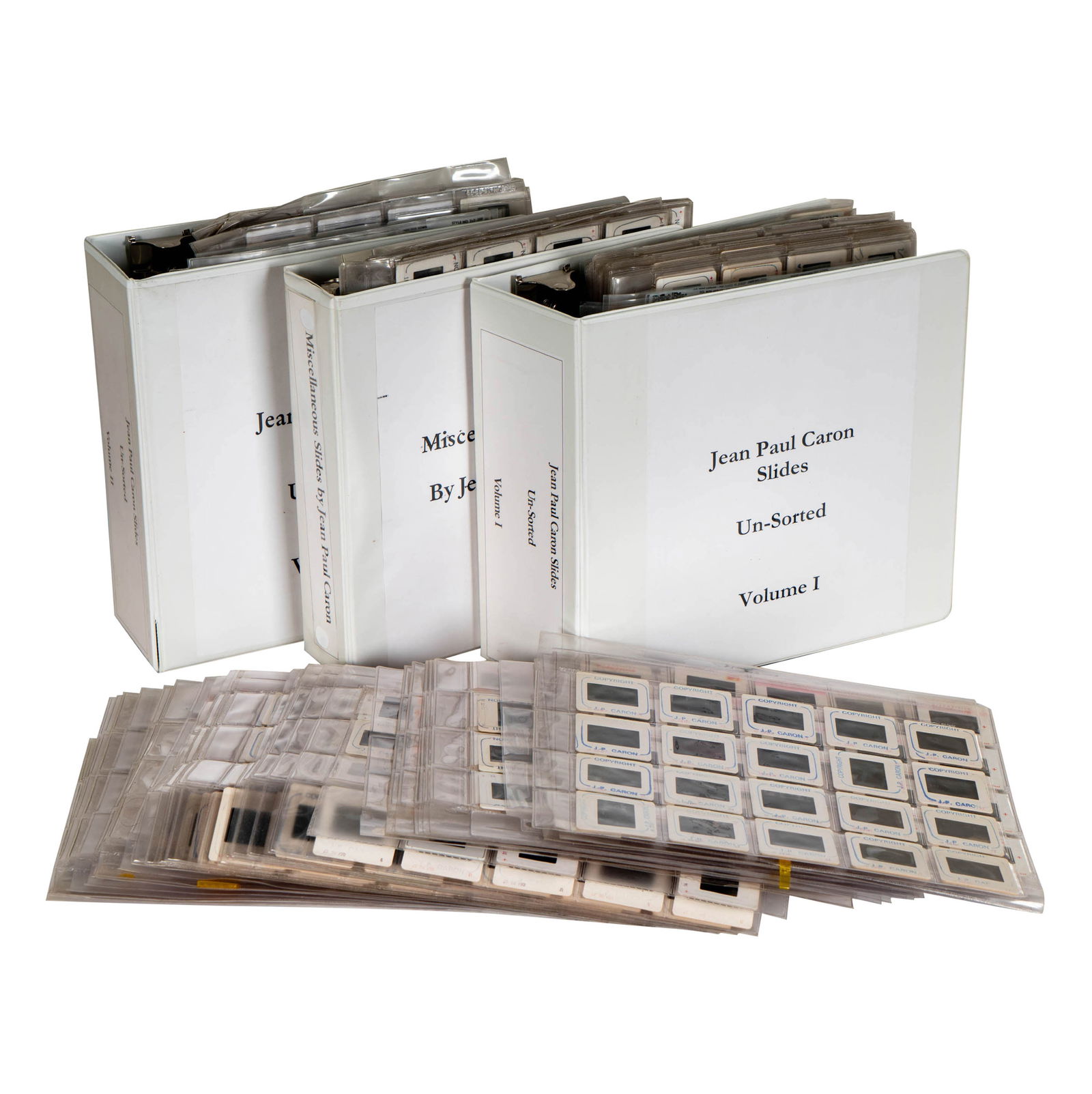 Large Collection of Jean Paul Caron Slides: two binders 