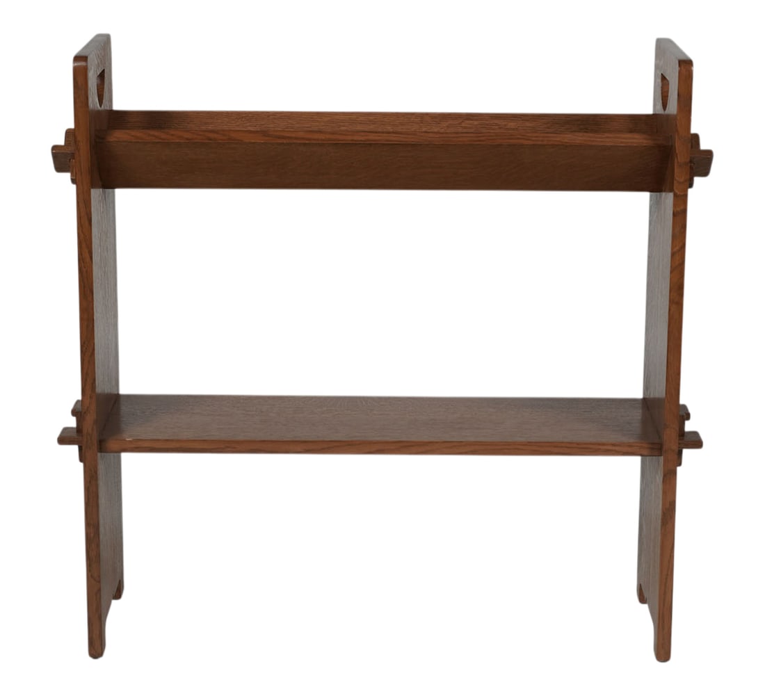 Stickley Oak Bookshelf: Manlius, NY, late 20th century; manufacturer's branded and metal labels to underside of lower shelf; 31 x 32 x 10 in. 