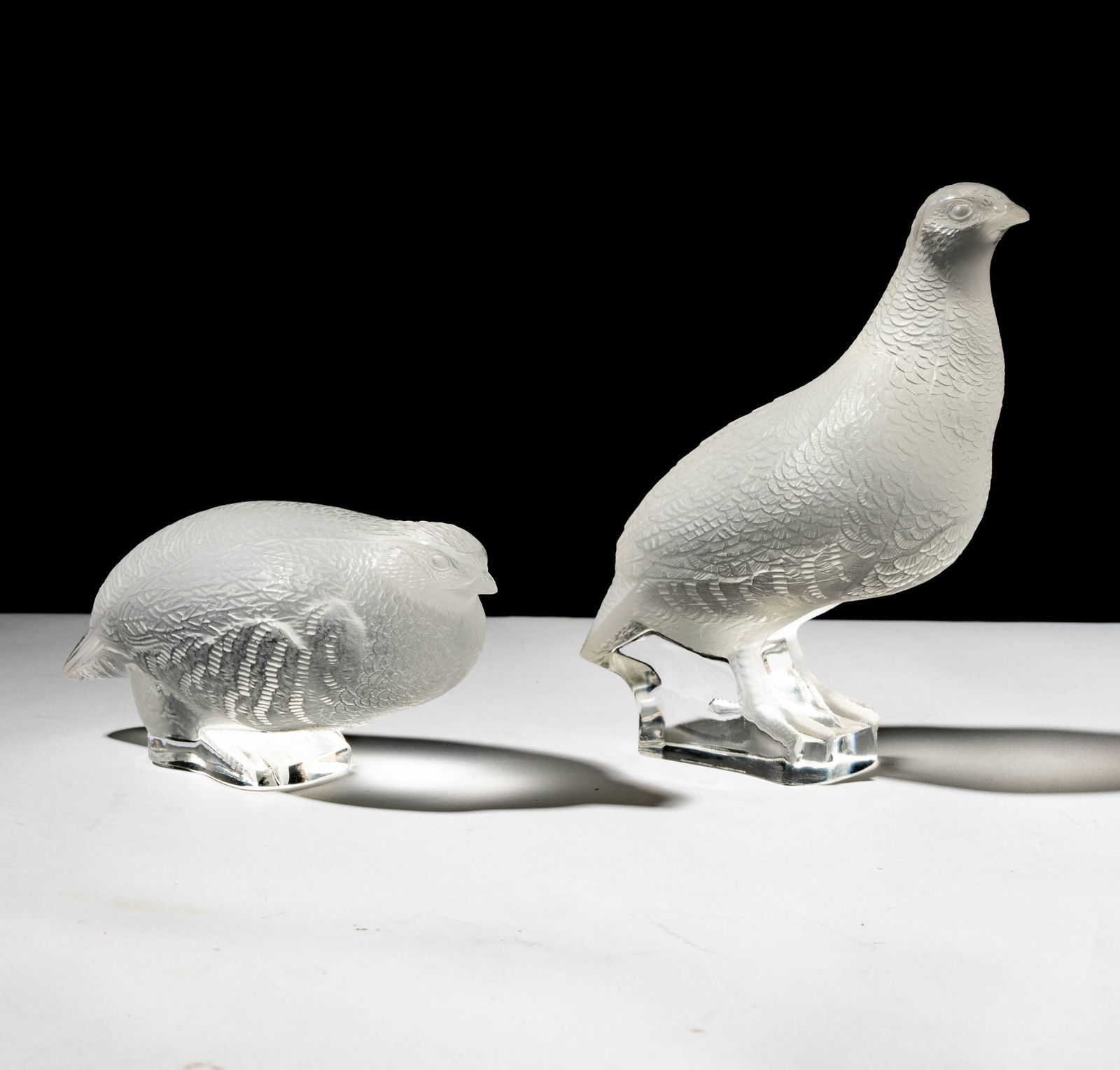 Two Lalique Glass Perdrix Partridge Figures: each signed "Lalique France", "Perdrix Debout": 7 in. high; "Perdrix Couchee": 6 in. wide