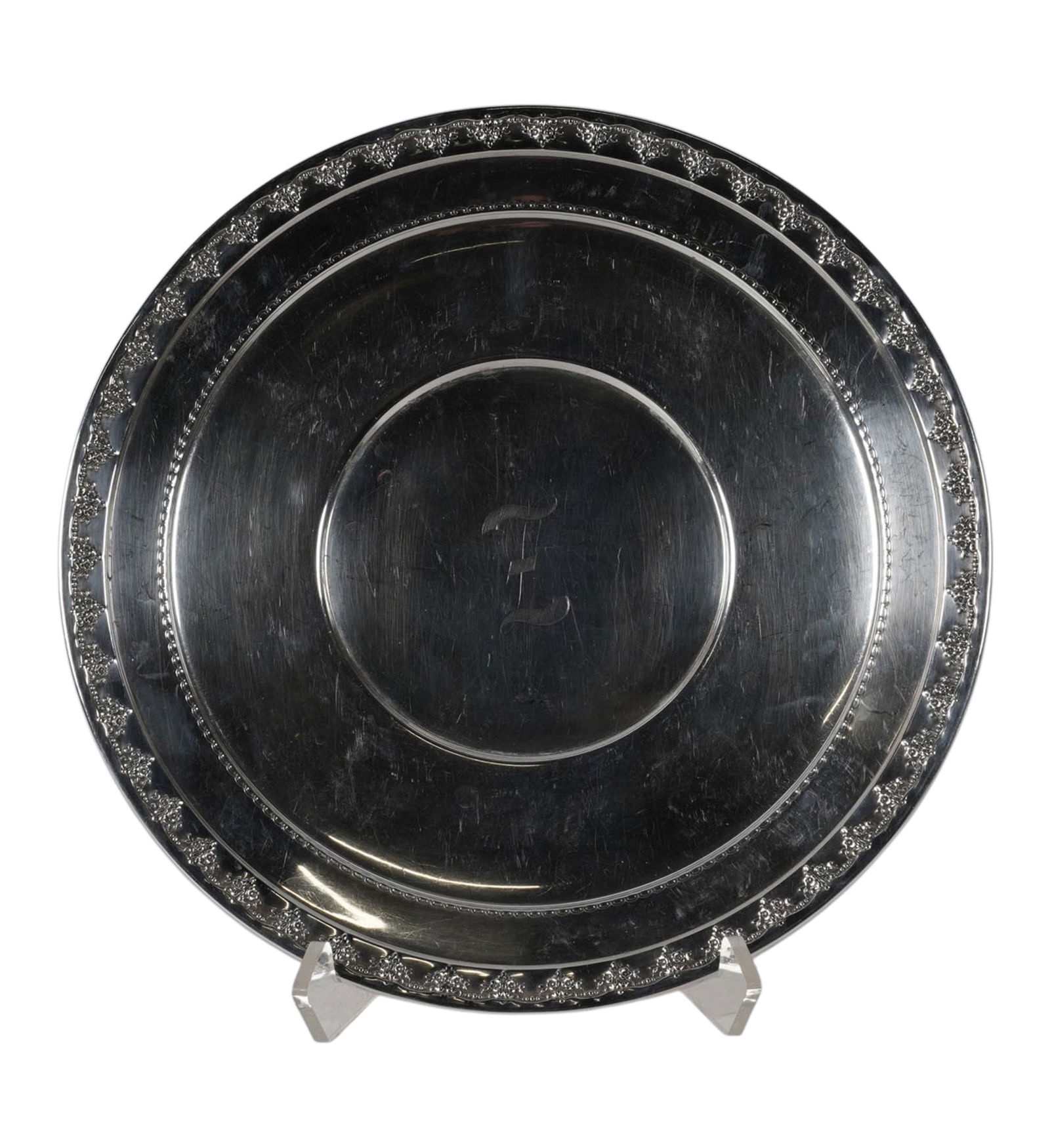 Reed and Barton Sterling Round Tray: monofgrammed "Z" to center, with maker's marks and further marked "Sterling", Approximately 674 grams, 14 1/4 in. dia.