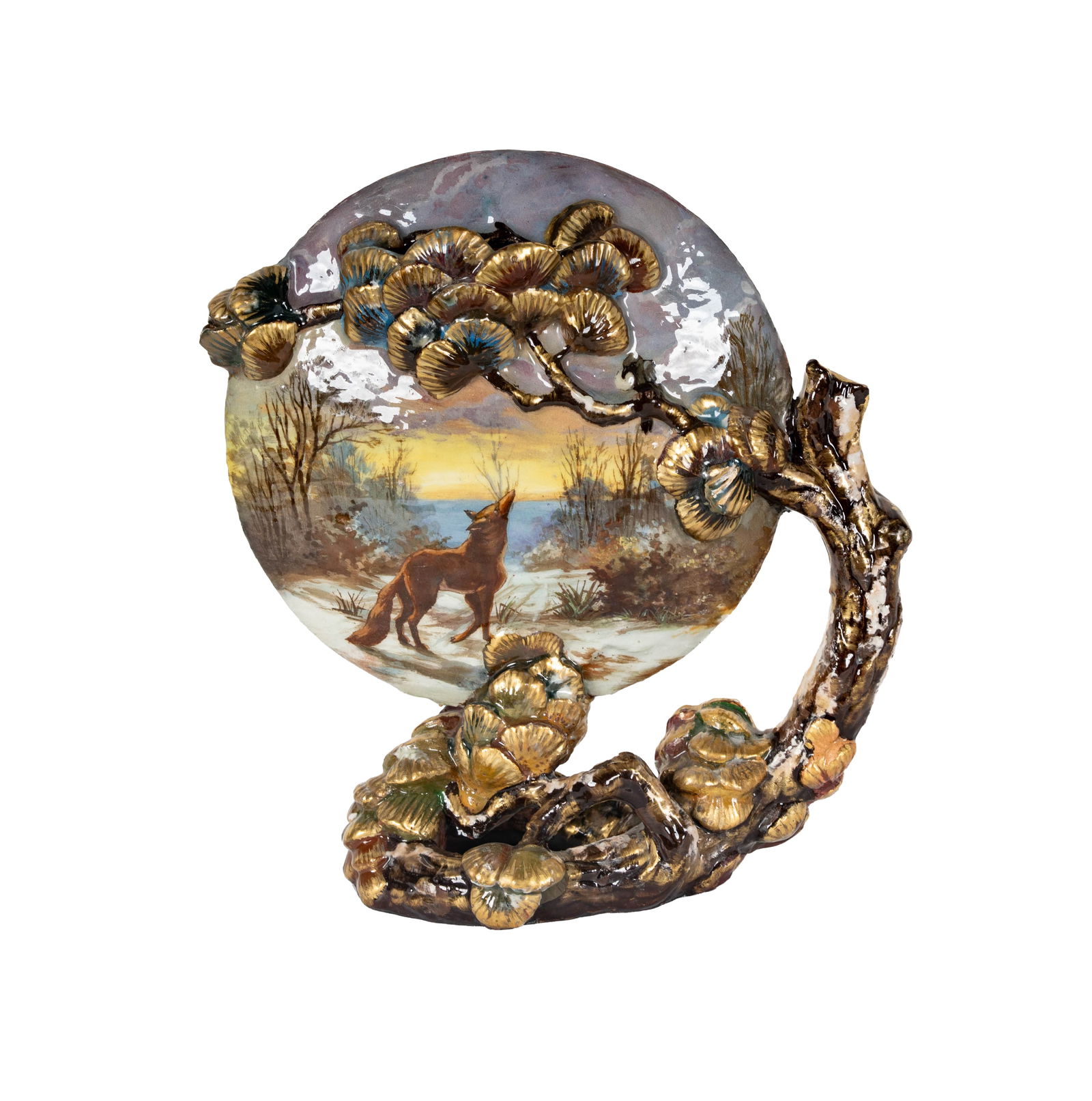 Emile Galle (1846-1904): Pitcher: faience, c. 1900, disk-form, painted to each side with a winter landscape, one side with a fox, on a tree branch-form base extending to a handle, with branches forming the spout, with gilt-painted