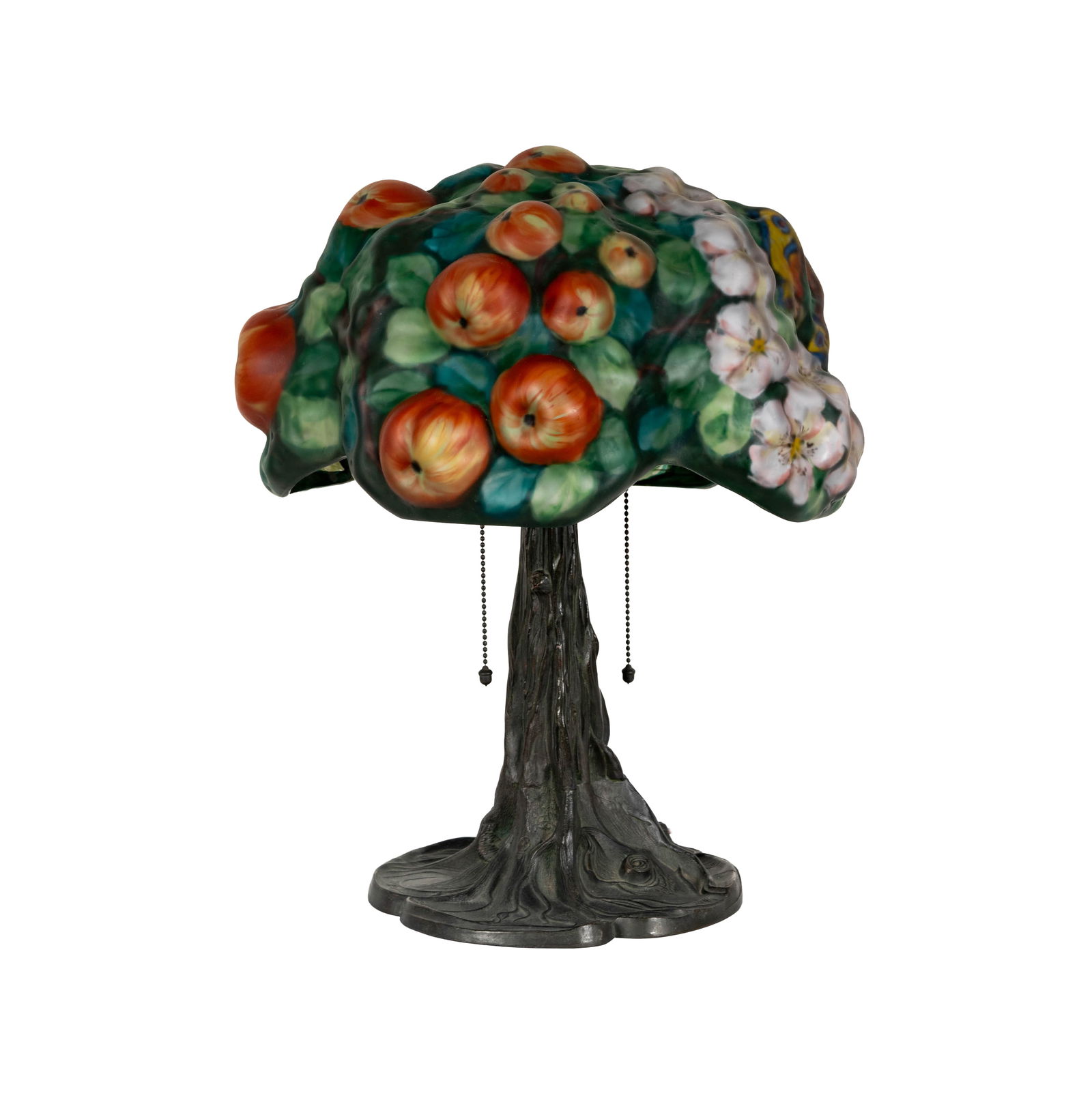 A Pairpoint Puffy Apple Tree Table Lamp: New Bedford, MA, early 20th century, the reverse-painted glass shade unsigned, the patinated metal tree trunk-form base faintly marked "Pairpoint Mfg. Co. [P within diamond shape]" and numbered