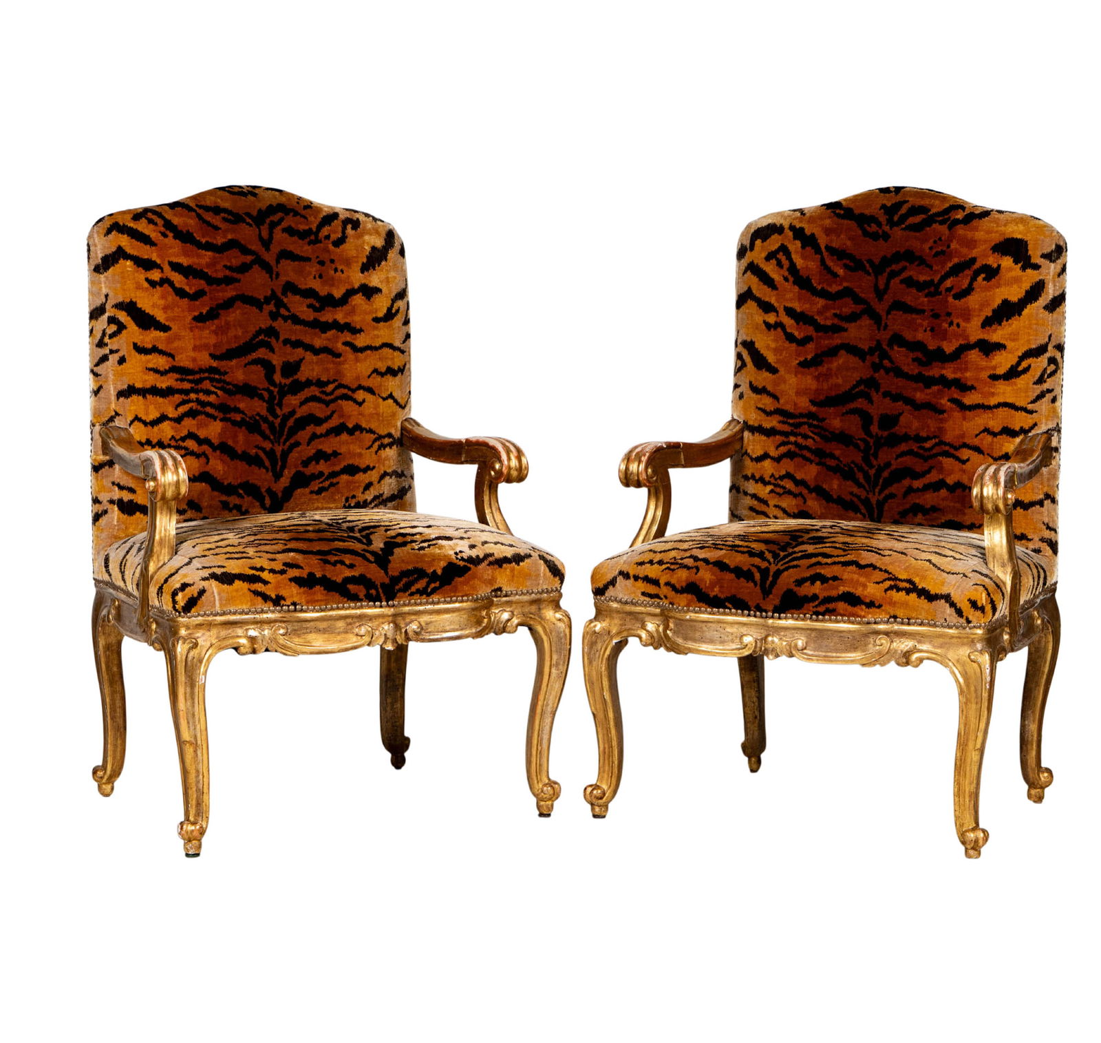 A Pair of Giltwood Bergeres with Scalamandré Fabric: upholstered in Fortuny "Tigre" pattern silk velvet, 45 x 30 x 23 in., seat height: 19 in.