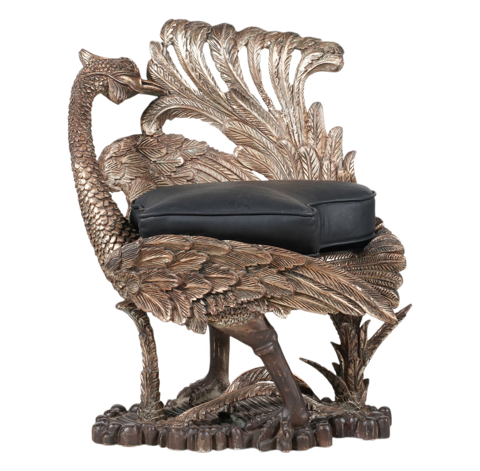 A Rococo-Style Carved Giltwood Grotto Chair: 36 1/2 x 29 x 18.1/2 in., seat height: 22 1/2 in.