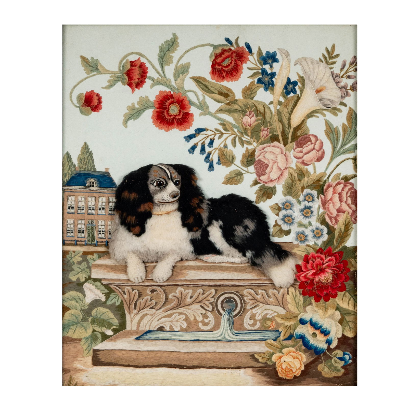 A Woolwork Picture of a Spaniel Dog: probably 19th century; the dog with glass eyes, frame: 28 x 24 in.