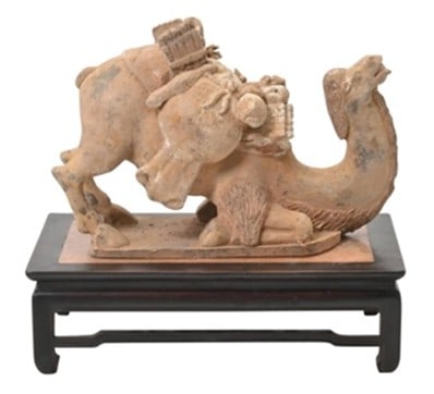 A Chinese Tang Dynasty Pottery Recumbent Camel Figure (1 of 12)