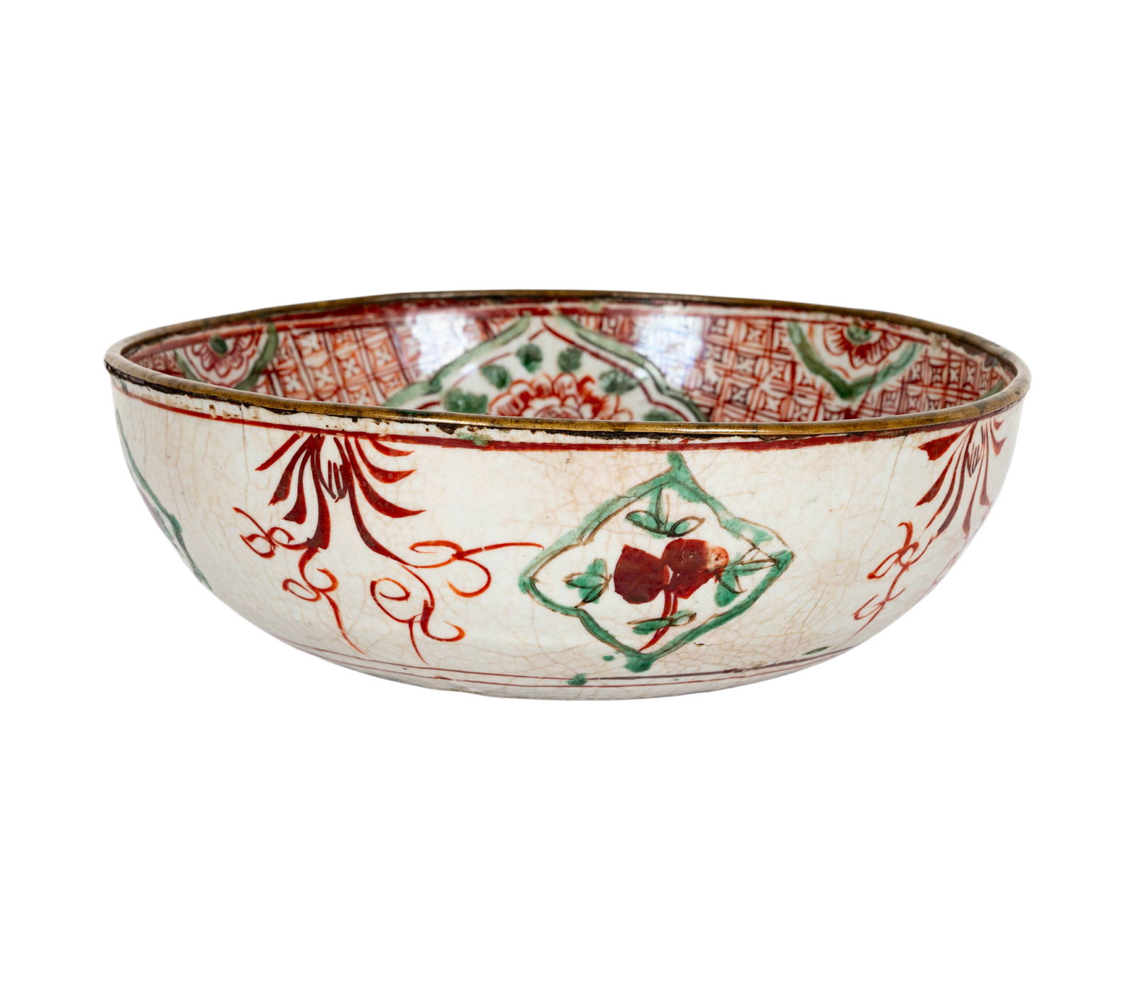 A Chinese Swatow Bowl: 17th century, with copper rim, 11 in. dia.
