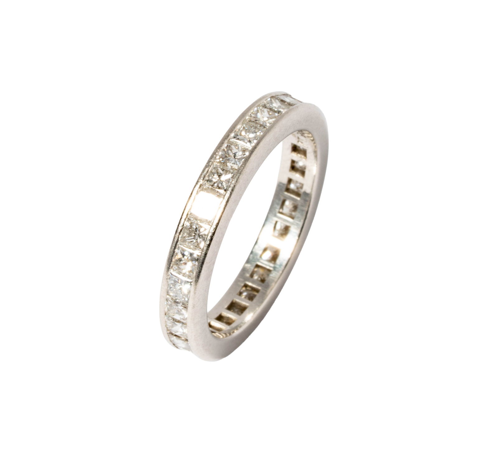Tiffany & Co., Platinum, Diamond Eternity Band: Containing 29 square-shape modified brilliant-cut diamonds [F-G/VVS-VS] weighing approximately 1.75 carats total; band width is 3.30 mm; size: 6; 4.3 grams