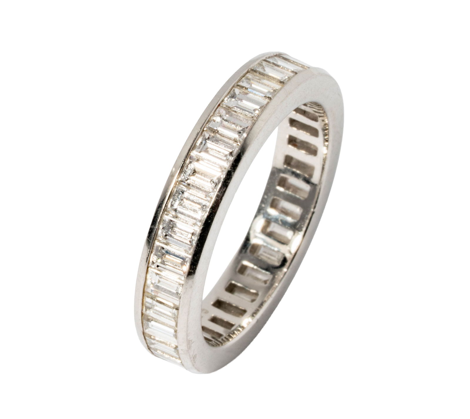 Tiffany & Co. Platinum Baguette Eternity Ring: set with 33 baguette shaped diamonds [G/VS1] weighing 3.60 carats approximately; size: 8-1/4, weighing 6.7 grams