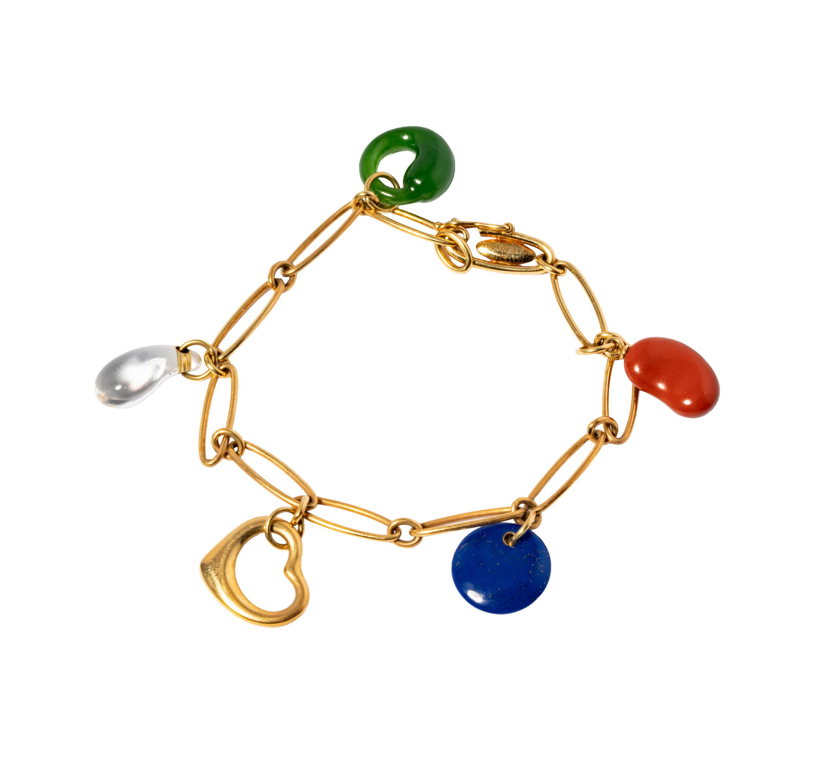 Tiffany & Co. Elsa Peretti 18 Karat Yellow Gold & Multi-Stone Charm Bracelet: Containing a red jasper bean charm, a lapis lazuli disc charm, a gold heart, a rock crystal teardropcharm, and a nephrite round charm; measuring7- inches long, weighing13.1 grams;