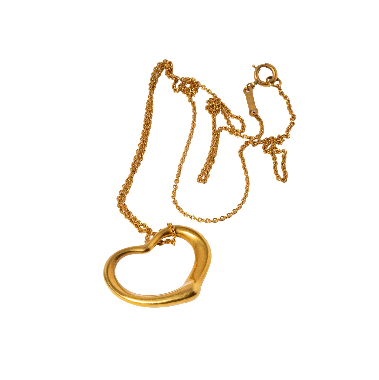 Tiffany & Co. Elsa Peretti 18 Karat Yellow Gold Heart Necklace: Including one Elsa Peretti for Tiffany Co. heart necklace measuring 14-3/4 inches long, weighing 6 grams;