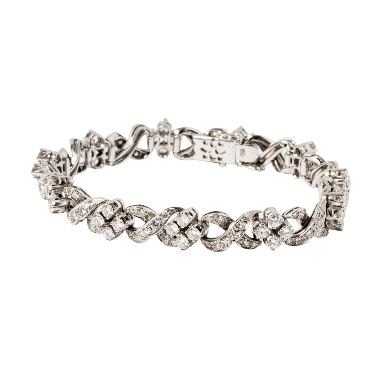 18 Karat White Gold and Diamond Bracelet: set with 143 small round diamonds [G-H/VS2-SI] together weighing approximately 5.5 carats total; measuring 6-1/2 inches long, weighing 22.8grams;