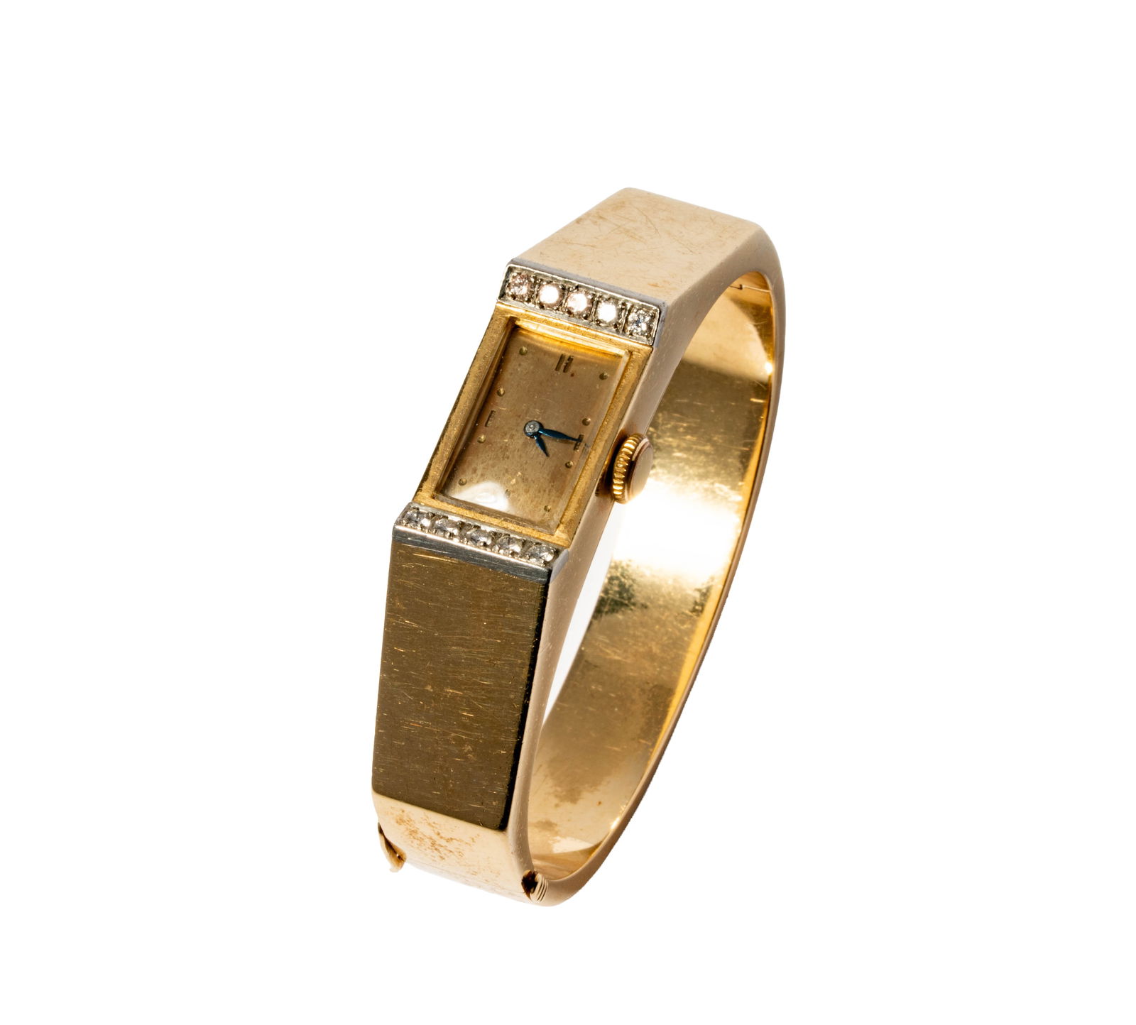 14 Karat Yellow Gold Diamond Bangle Watch: Including one bangle watch set with 10 small round diamonds weighing approximately 0.25 carats; measuring 6-1/2 inches inside and 14.75mm wide, weighing 48.3 grams;