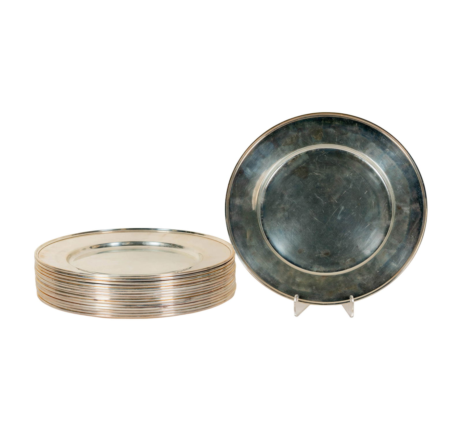 A Set of 16 Fisher Silversmiths Sterling Chargers: Jersey City, NJ, c. 1936 - 1970s; each with makers mark and further marked Sterling, approximately 6,395 grams total, each 11 in. dia.