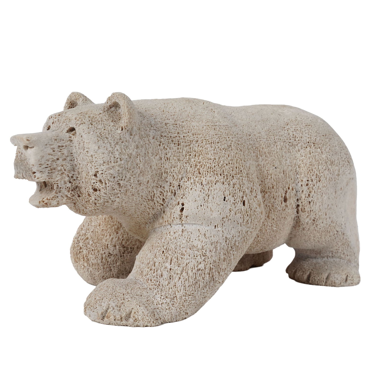 Carved Bone Sculpture of a Bear: signed to underside, 4 1/2 x 8 x 4 in.