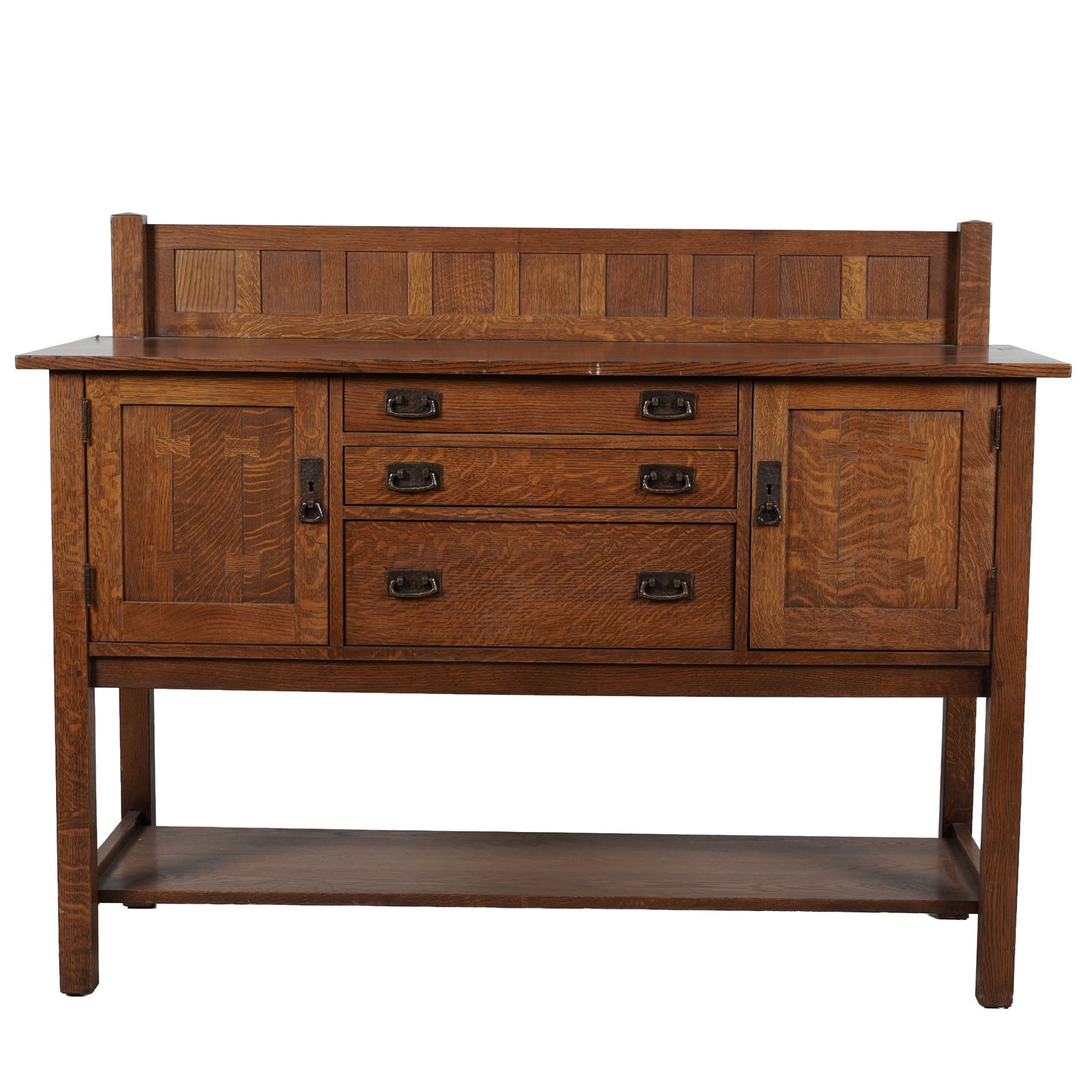 A Stickley Oak Sideboard: with a metal label and branded to the drawer. 46 x 60 x 22 in.