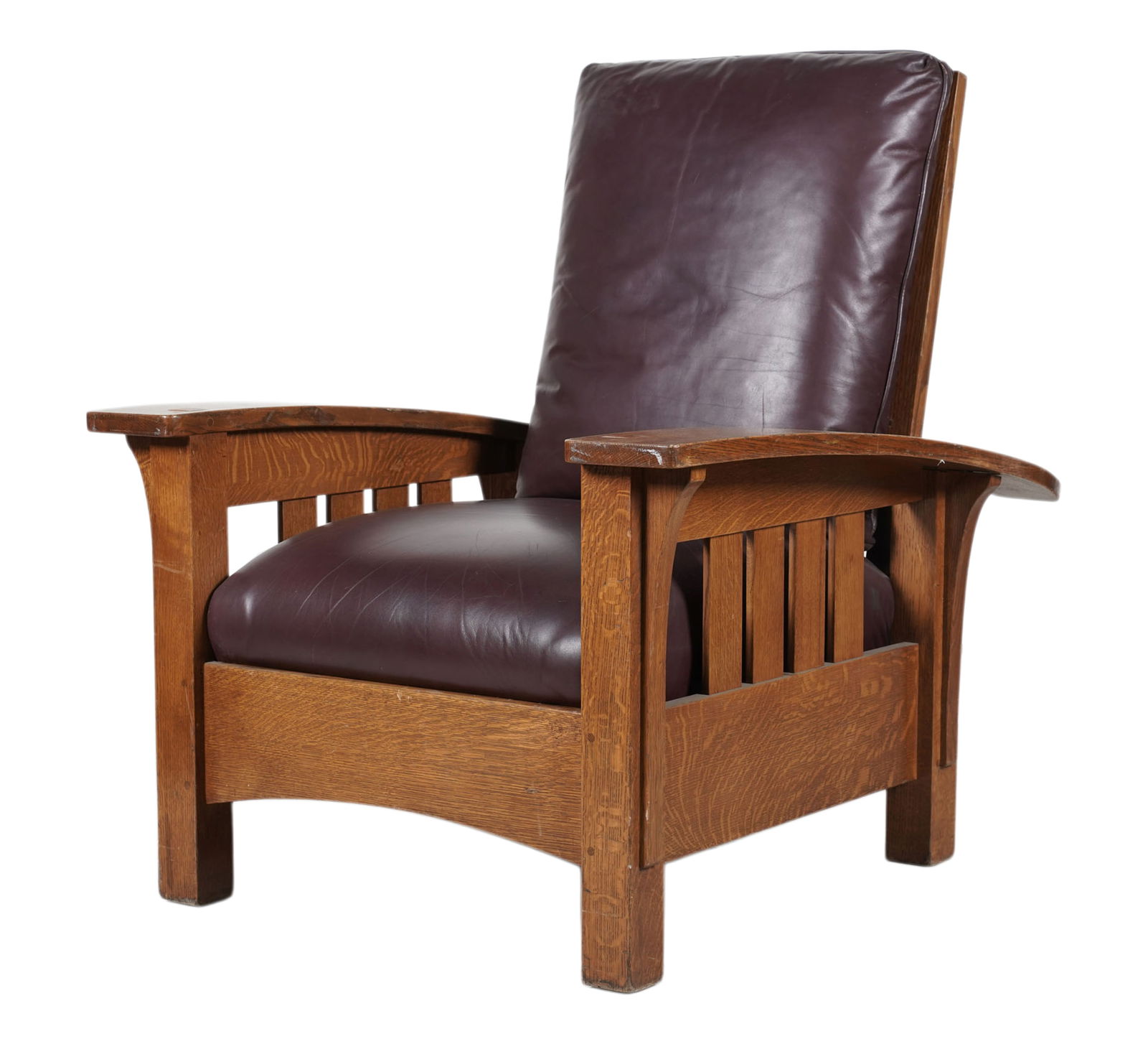 A Stickley Oak Morris Chair: label to underside, 41 x 34 3/4 x 40 1/2 in.
