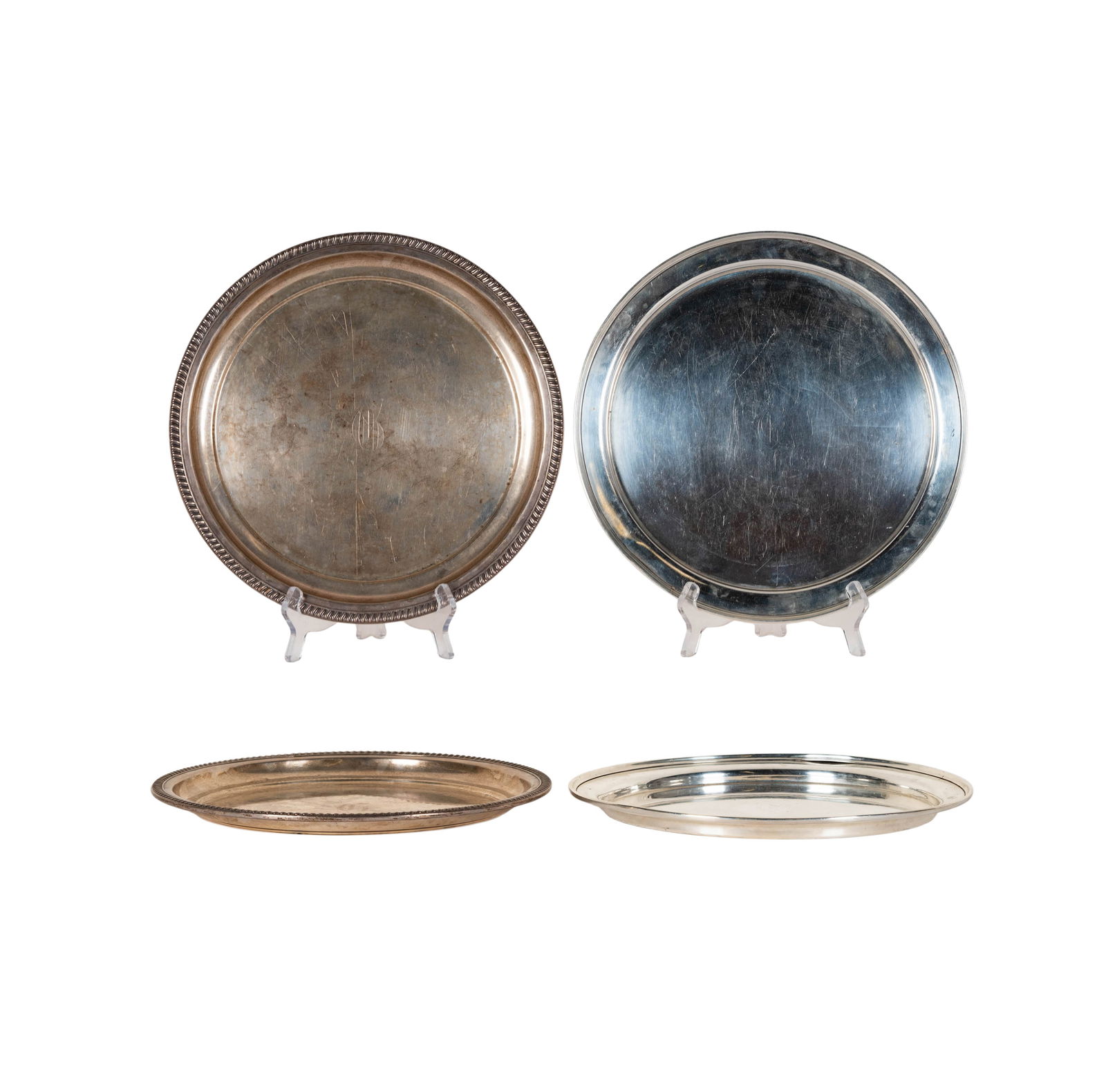 Two Assorted Round Sterling Trays: each 12 in. dia., approximately 1,045 grams