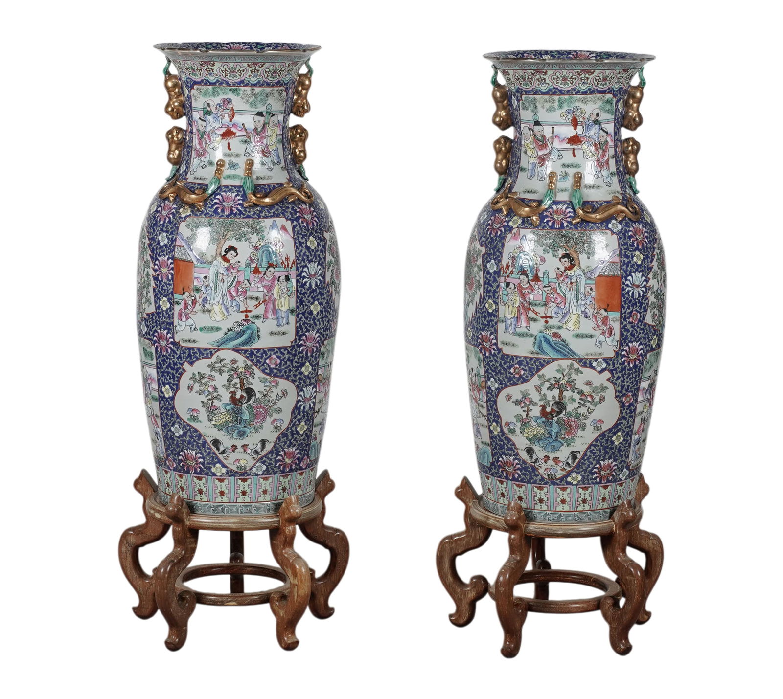 A Pair of Monumental Chinese Urns on Wooden Stands: Decorated with figures and floral design, marks to the underside. Pot: 36 3/4 x 15 in. Stand: 13 x 18 in. dia.
