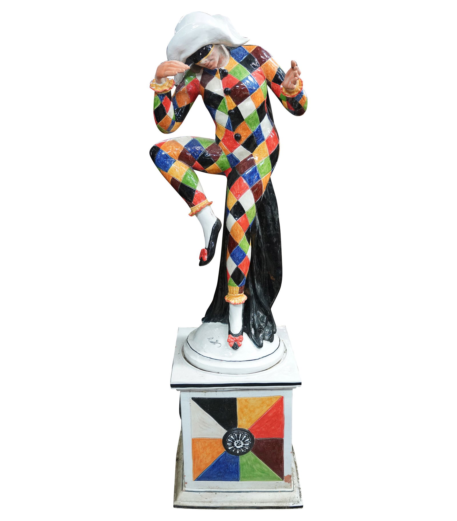 A Ceramic Figure of a Jester: on a companion ceramic base, overall: 71 x 19 1/2 x 19 1/2 in. (180.3 x 49.5 x 49.5 cm.)