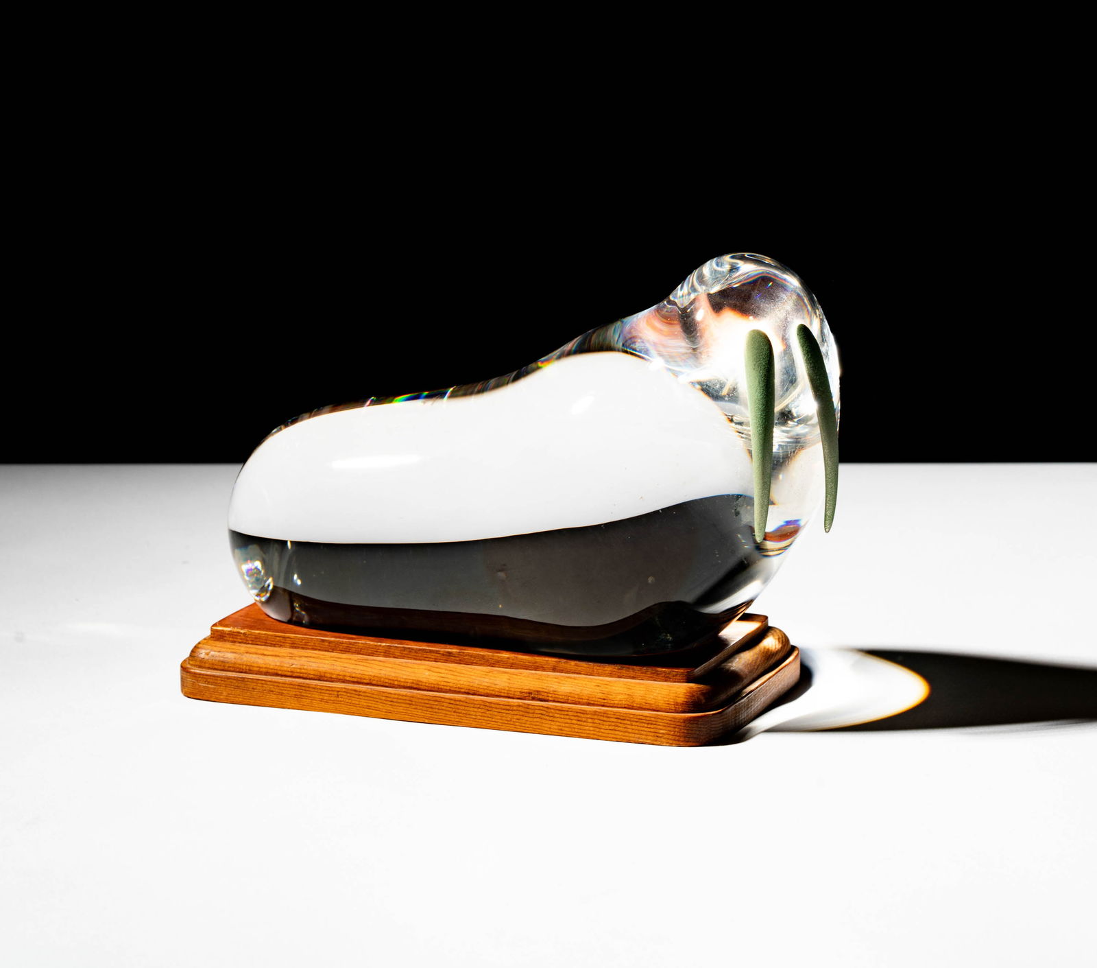 Steuben Glass Walrus Sculpture: with stand:5 1/4 x 7 1/2 x 3 3/4 in.