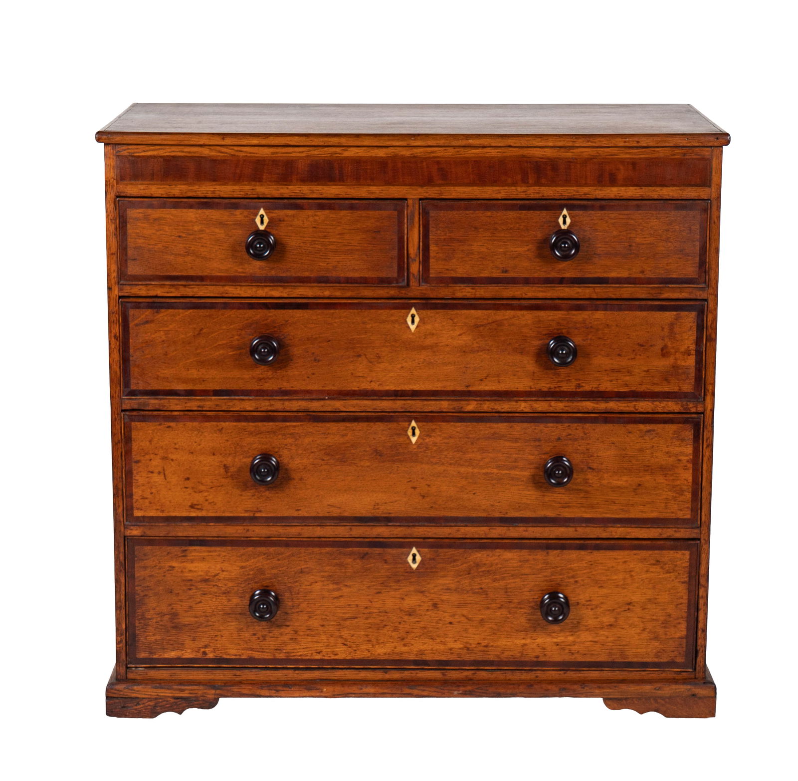 An English Two-Toned Oak Chest of Drawers (1 of 15)