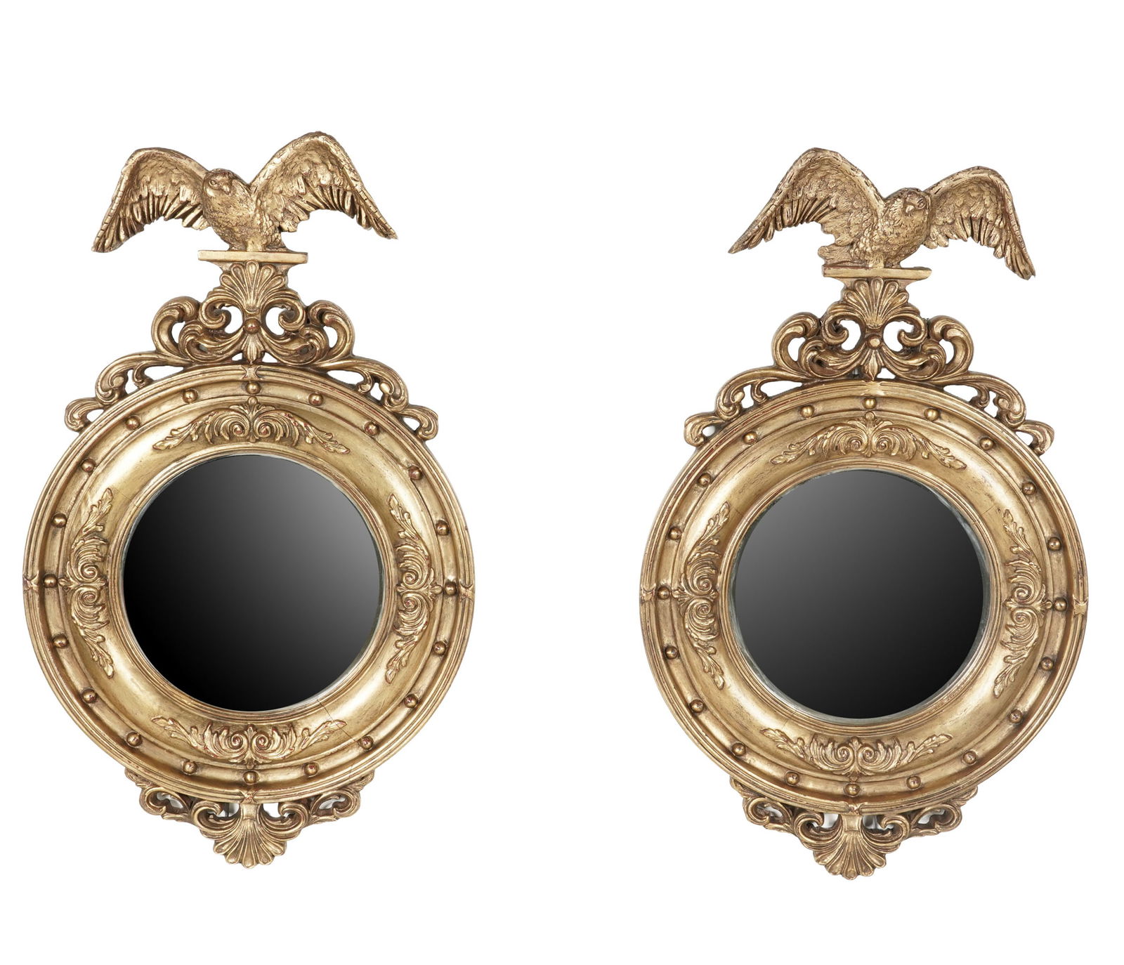 A Pair of English Wood Carved and Gilt Eagle Motif Mirrors: 43 x 26 1/2 in.