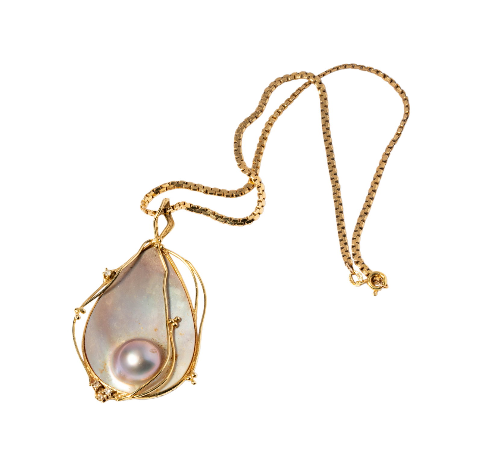 14 Karat Yellow Gold Chain and Pearl Pendant: Including one 14 karat yellow gold chain with wire framed blister pearl pendant accented with four small round diamonds; pendant measuring 2-3/4 inches tall, chain measuring 15-1/4 inches long,
