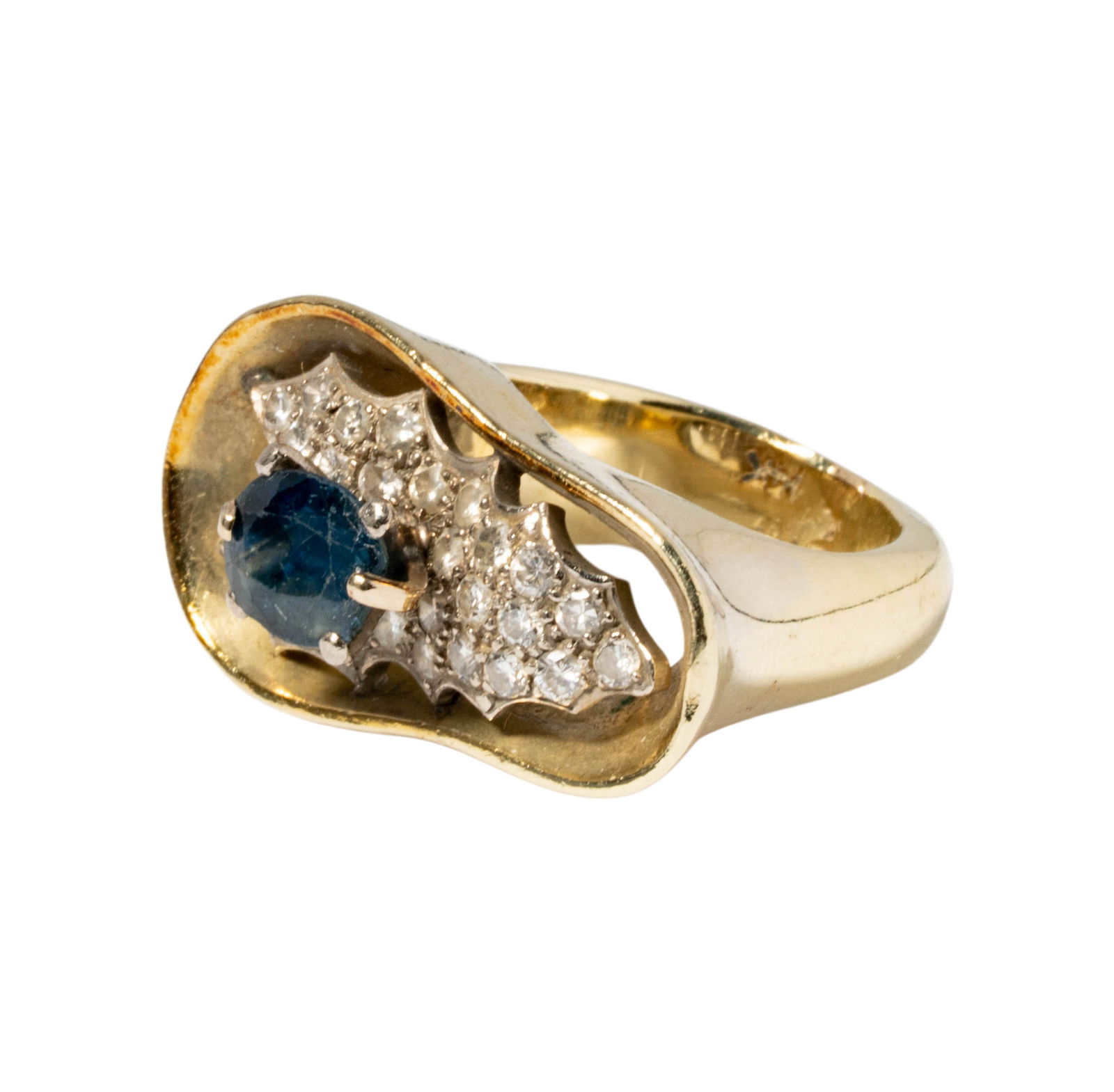 14 Karat Yellow Gold, Diamond, & Sapphire Ring: Including one 14 karat gold ring set with one oval sapphire weighing approximately 1.10 carats, set with 30 diamonds weighing approximately 0.80carats; size: 5-1/2, weighing 20.6 grams;