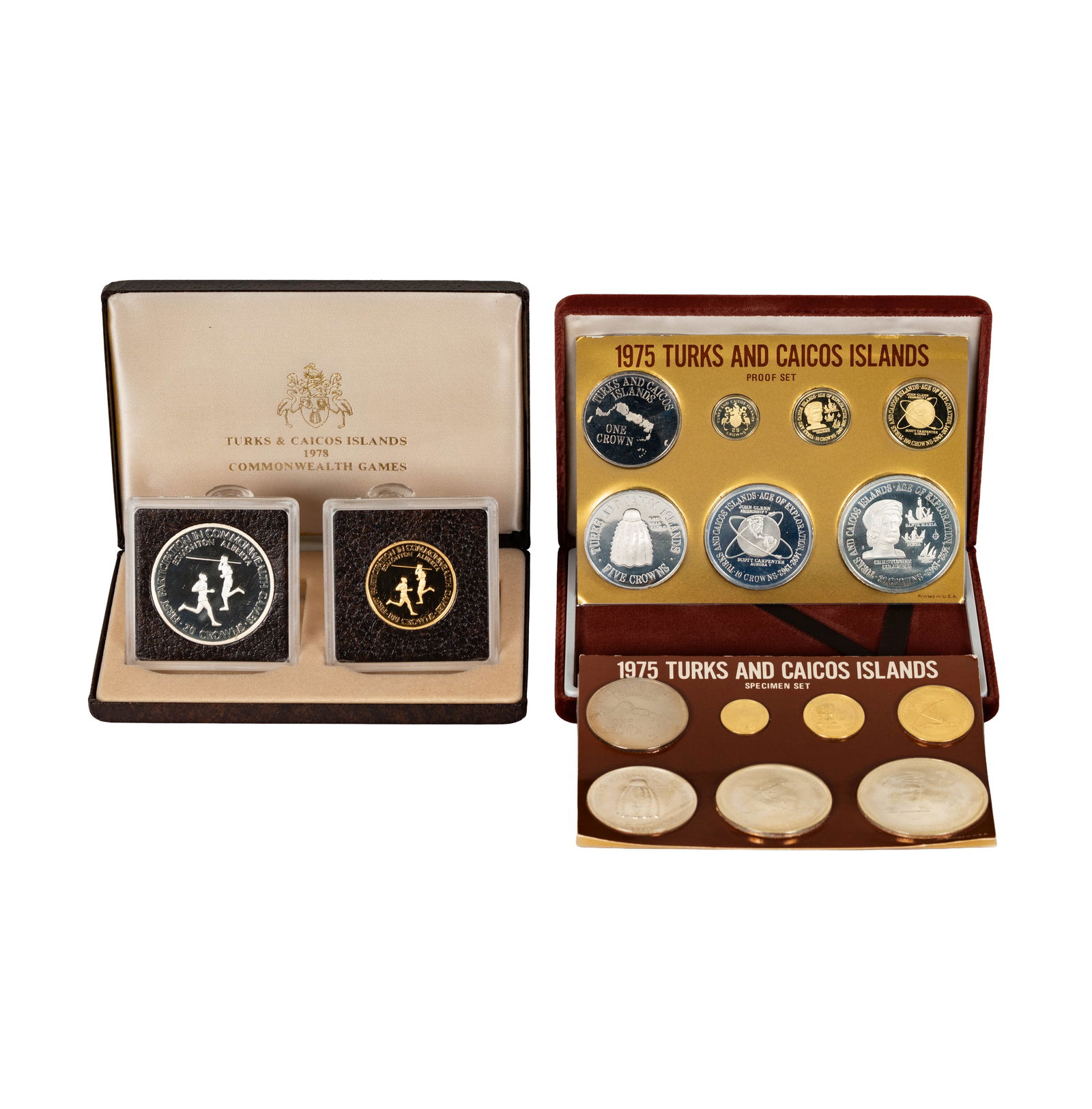 Gold and Silver Coins from Turks and Caicos Islands: 1-1975 Silver Proof Set, 1-1975 Specimen Set, 1-1978 Commonwealth Games Silver Proof 20 Crowns, 1-1978 Commonwealth Games Gold Proof 100 Crowns.