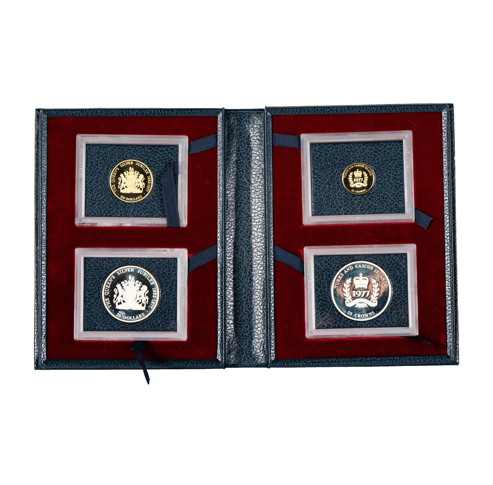 1977 Caymen Islands and Turks and Caicos Queen Elizabeth II Silver Jubilee Coin Set: Caymen Islands: $100 Gold Coin and $25 Silver Coin, Turks and Caicos 50 Crown Gold Coin and 25 Crown Silver Crown, with case and certificate of authenticity