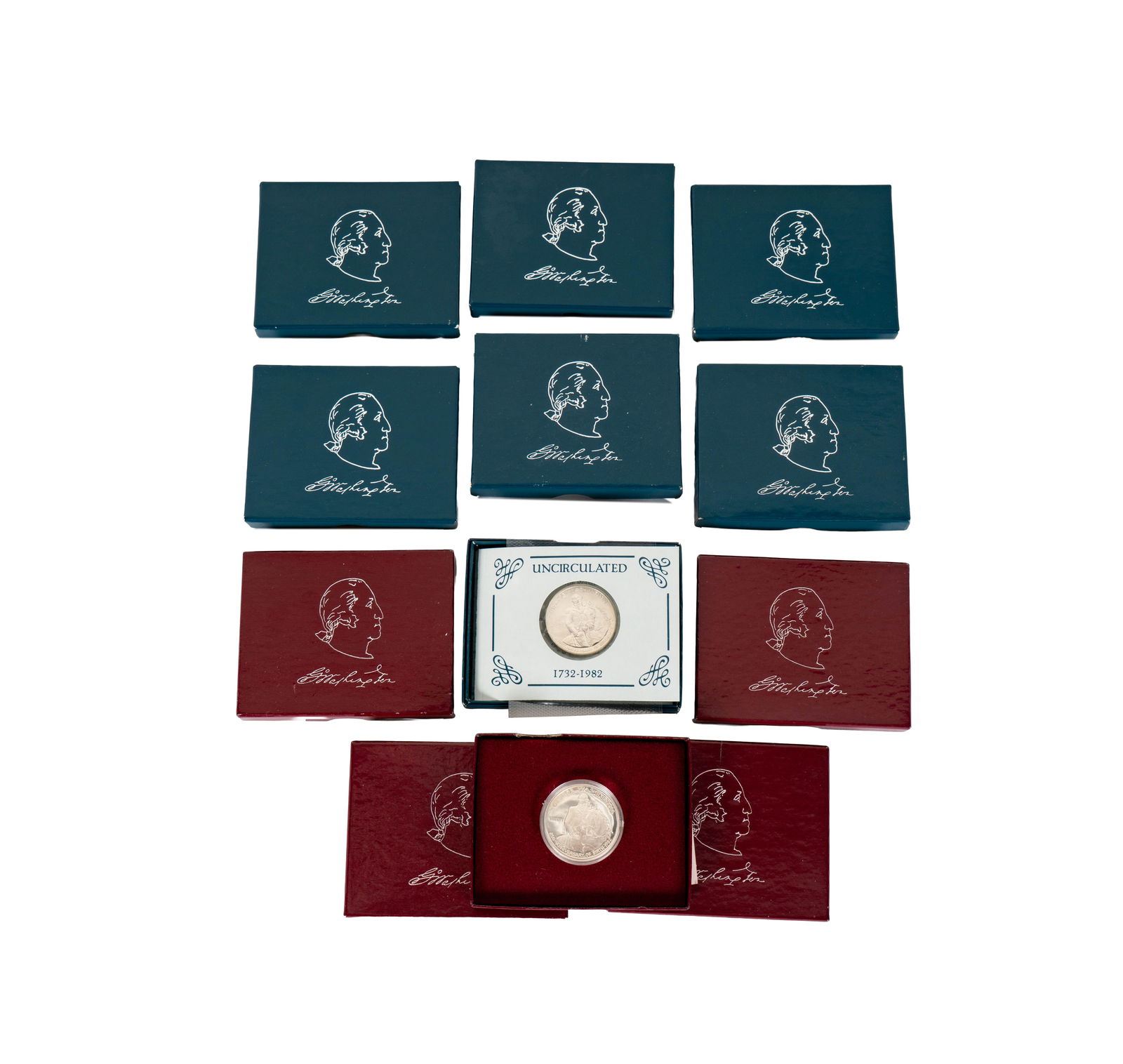 Collection of 1982 United States Half-dollar Coins: 7-1982 uncirculated half-dollars and 4-1982 Proof silver half-dollars with boxes and papers