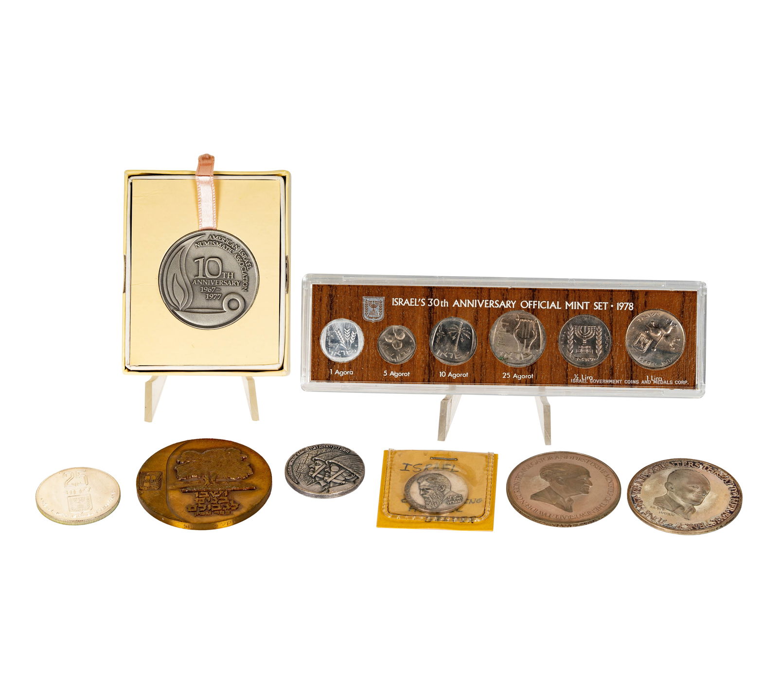 Collection of Israel Coins and Medals: -Moshe Dyan Silver Medal, 1-David Ben-Gurion Silver Commemorative Medal, 1-6 Day War Victory Medal, 1-Theodore Herzl .999 Silver medal, 1-1968 Bronze Anniversary of The State Of Israel, 1-1977 Silver