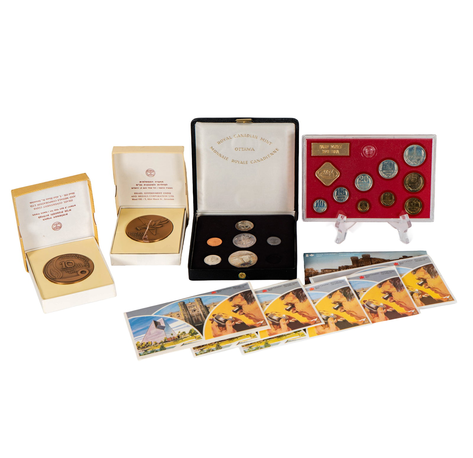 Collection of World Coins and Medals: Canada 1-1978, 1-1979, 1-1981, 1-1982, 1-1983, 1-1984 Brilliant Uncirculated mint sets, 1-1978 Coins of the USSR Coin Set, 2-Bronze Israel State medals in boxes, 1-1967 Canada proof set in case.