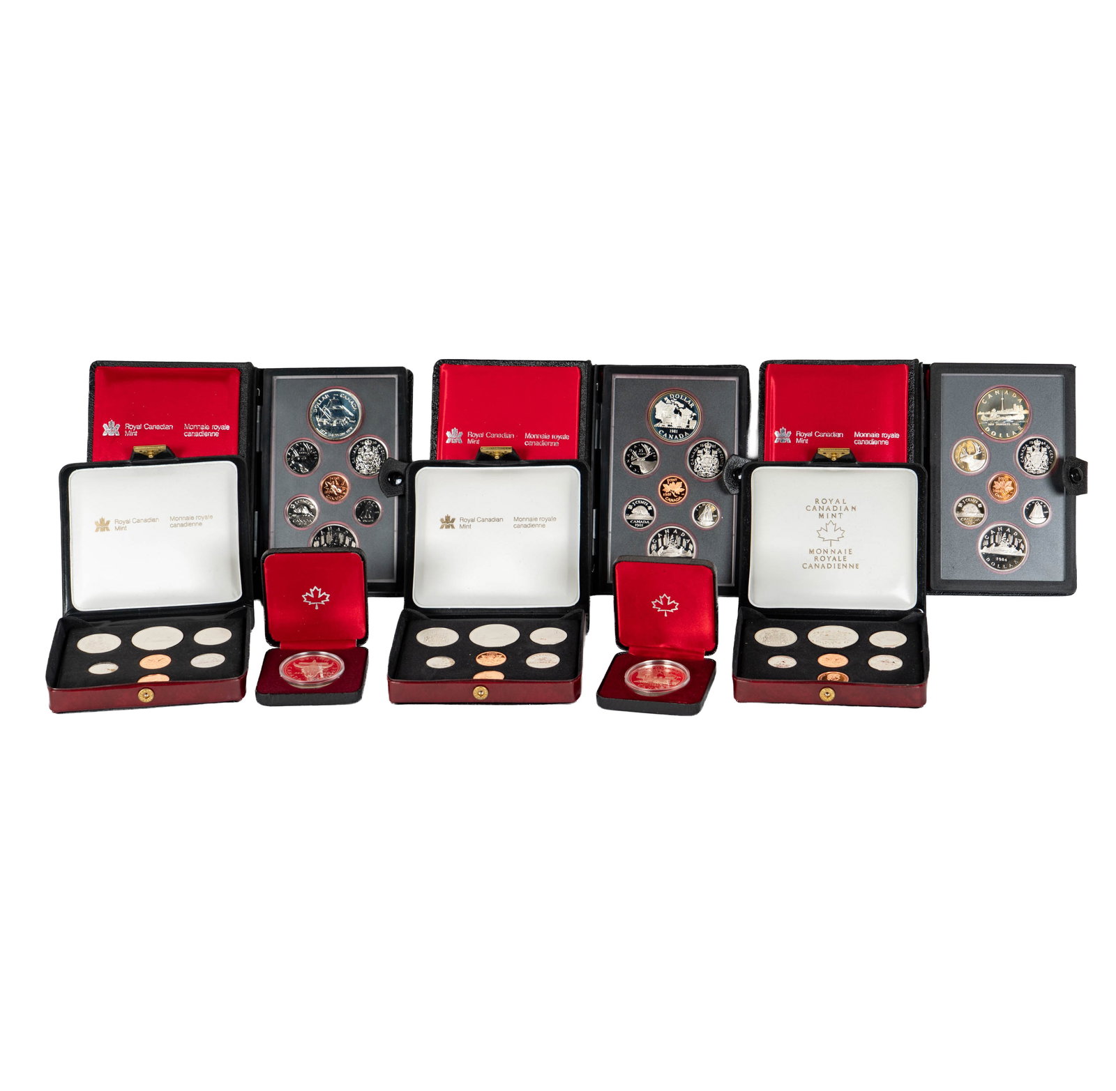 Collection of Canadian Coins: 1-1981 Silver Proof dollar in box, 1-1982 Silver proof dollar in box, 1-1978, 1979, 1980 Uncirculated sets with original box and papers, 1-1979 Proof set with silver dollar in box with papers, 1-1981
