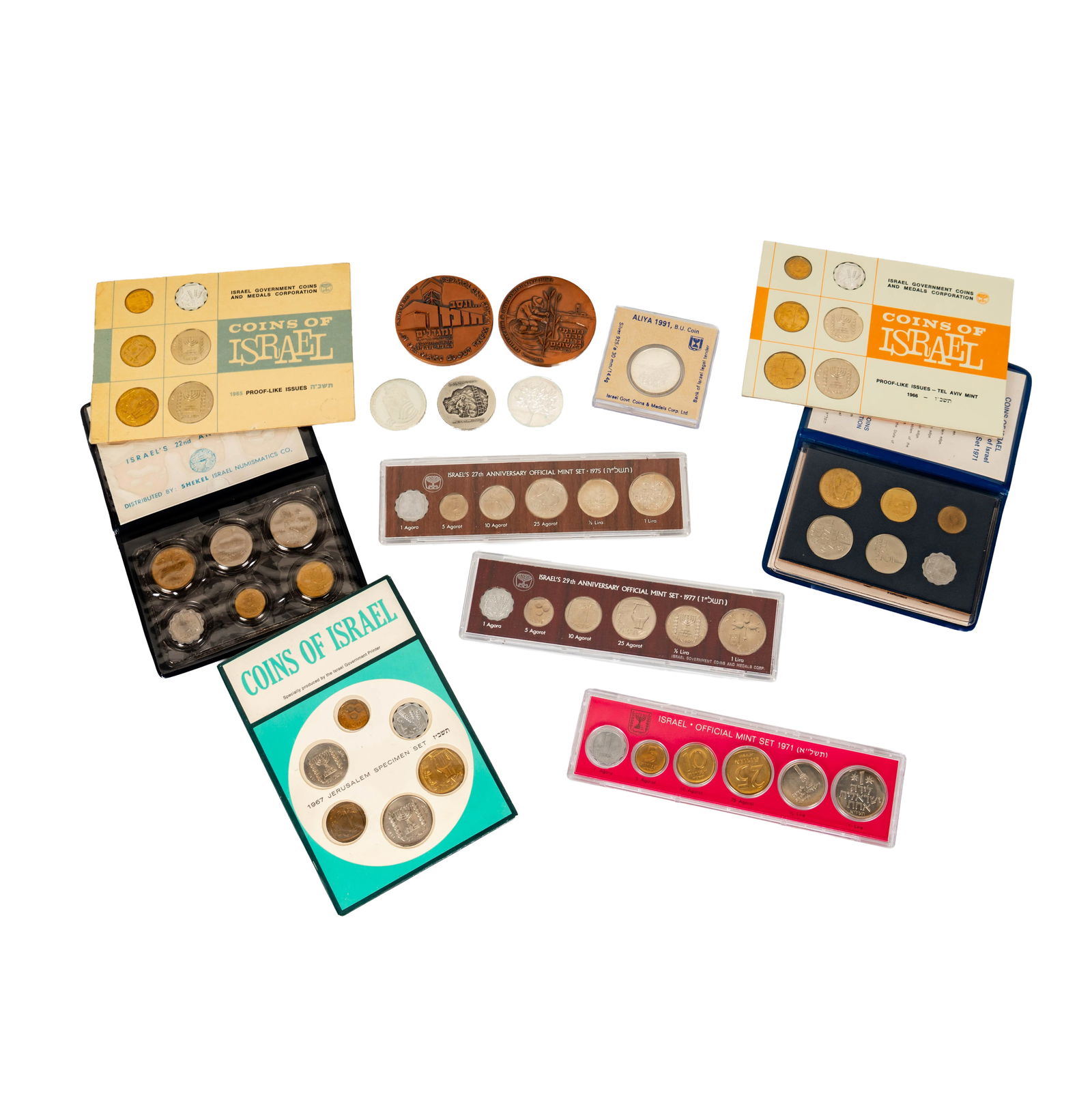 Collection of Israel Coins and 3 Israel Medals: 1-1965, 1966, 1967 6 coin proof-like sets in cards, 1-1971, 1975, 1977 in boxes, 1-1971 Specimen set in plastic binder, 1-1970 Uncirculated set in plastic binder, 1-1991 Aliya Silver Commemorative coi