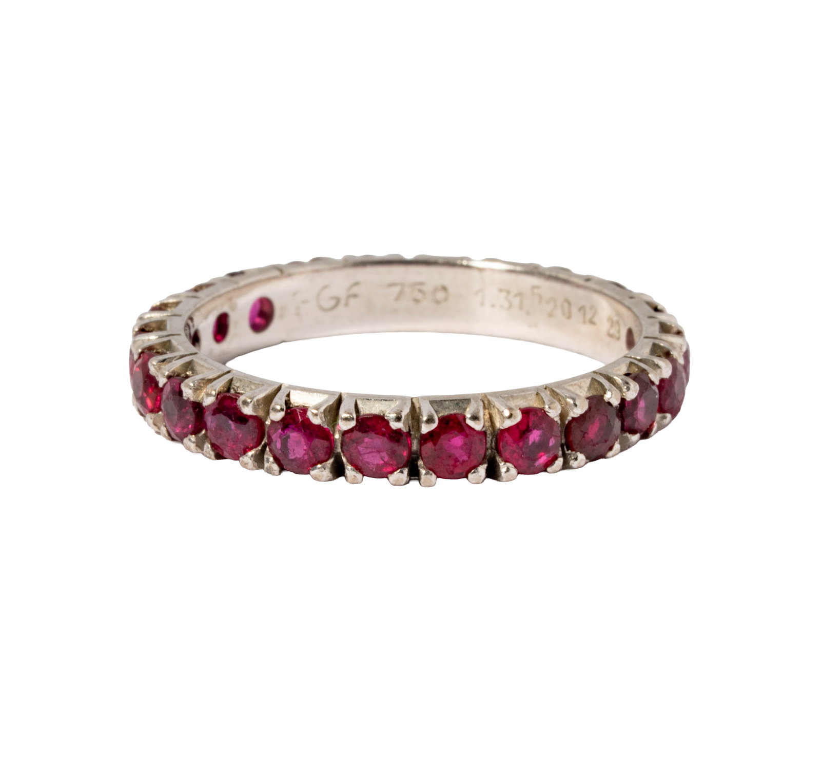 18 Karat White Gold Ruby Ring: Including one 18 karat white gold ruby eternity band set with 22 small rubies weighing approximately 1.60 carats total; size: 8-3/4, weighing 4.1 grams;