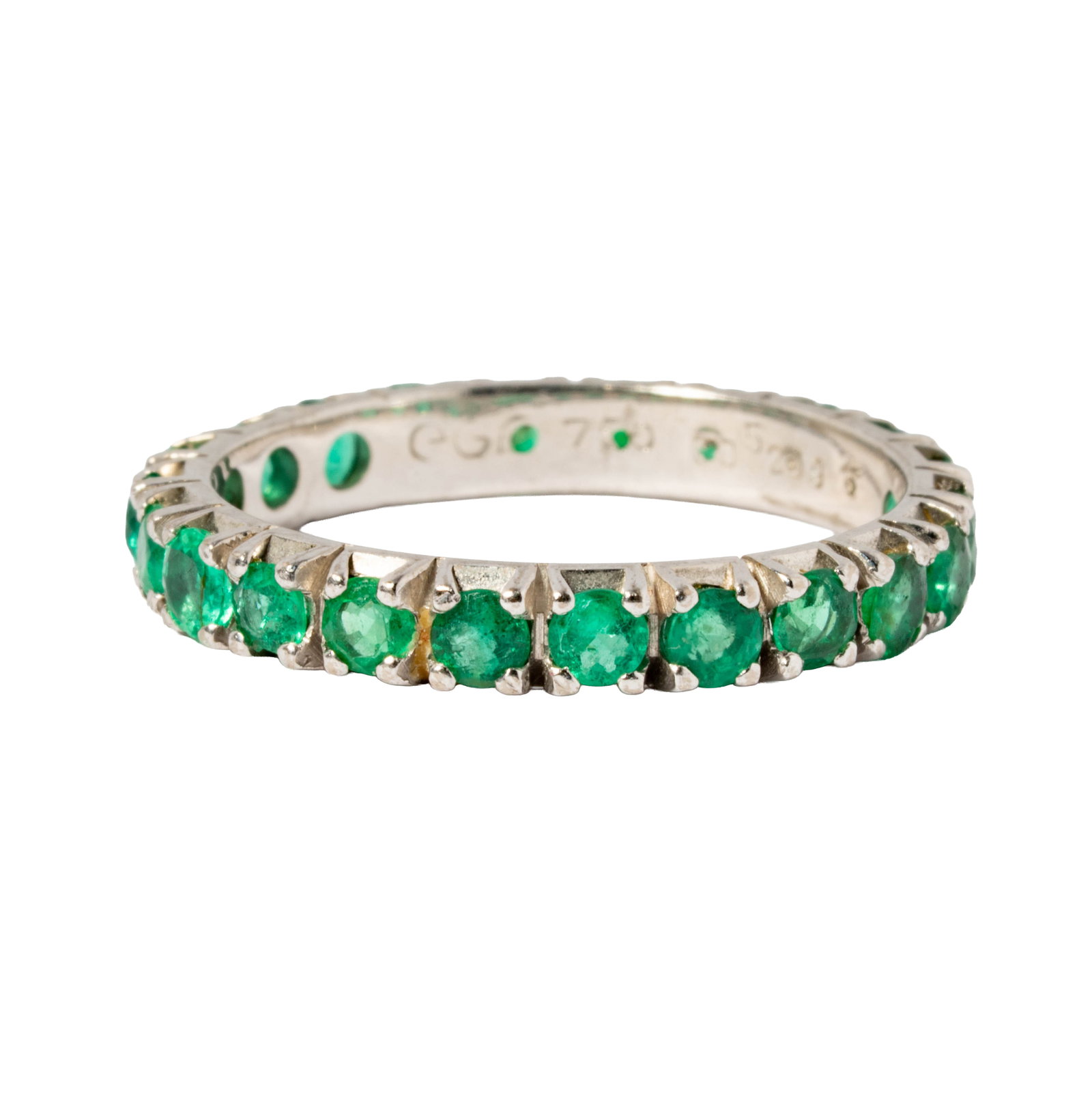18 Karat White Gold Emerald Ring: set with 22 small round emeralds weighing approximately 1.10 carats;size: 9, weighing 3.7 grams;