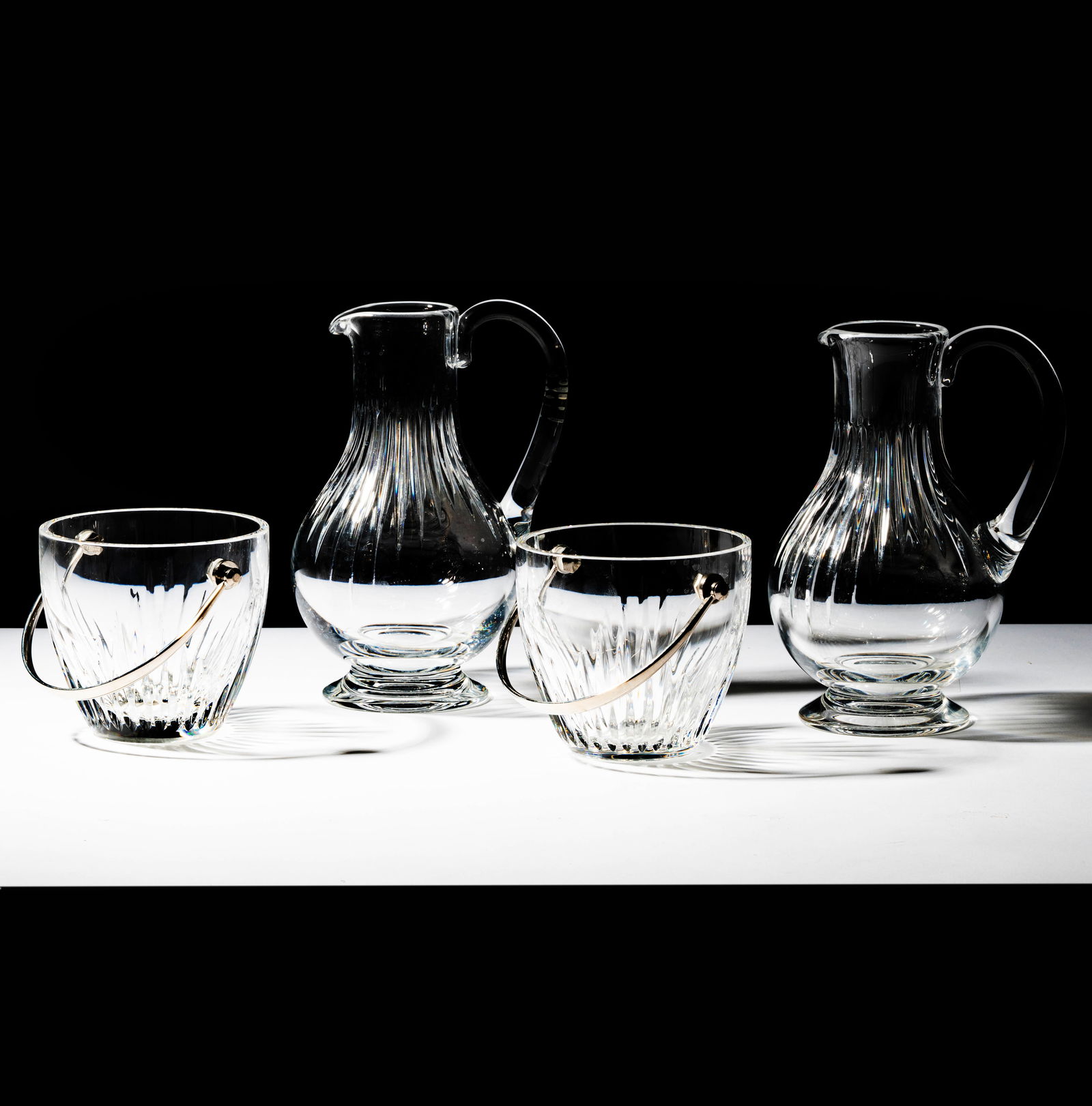 Group of Baccarat Crystal Massena Ice Buckets and Pitchers: comprising two pitchers and two ice buckets, each marked, tallest pitcher: 9 3/4 in. high