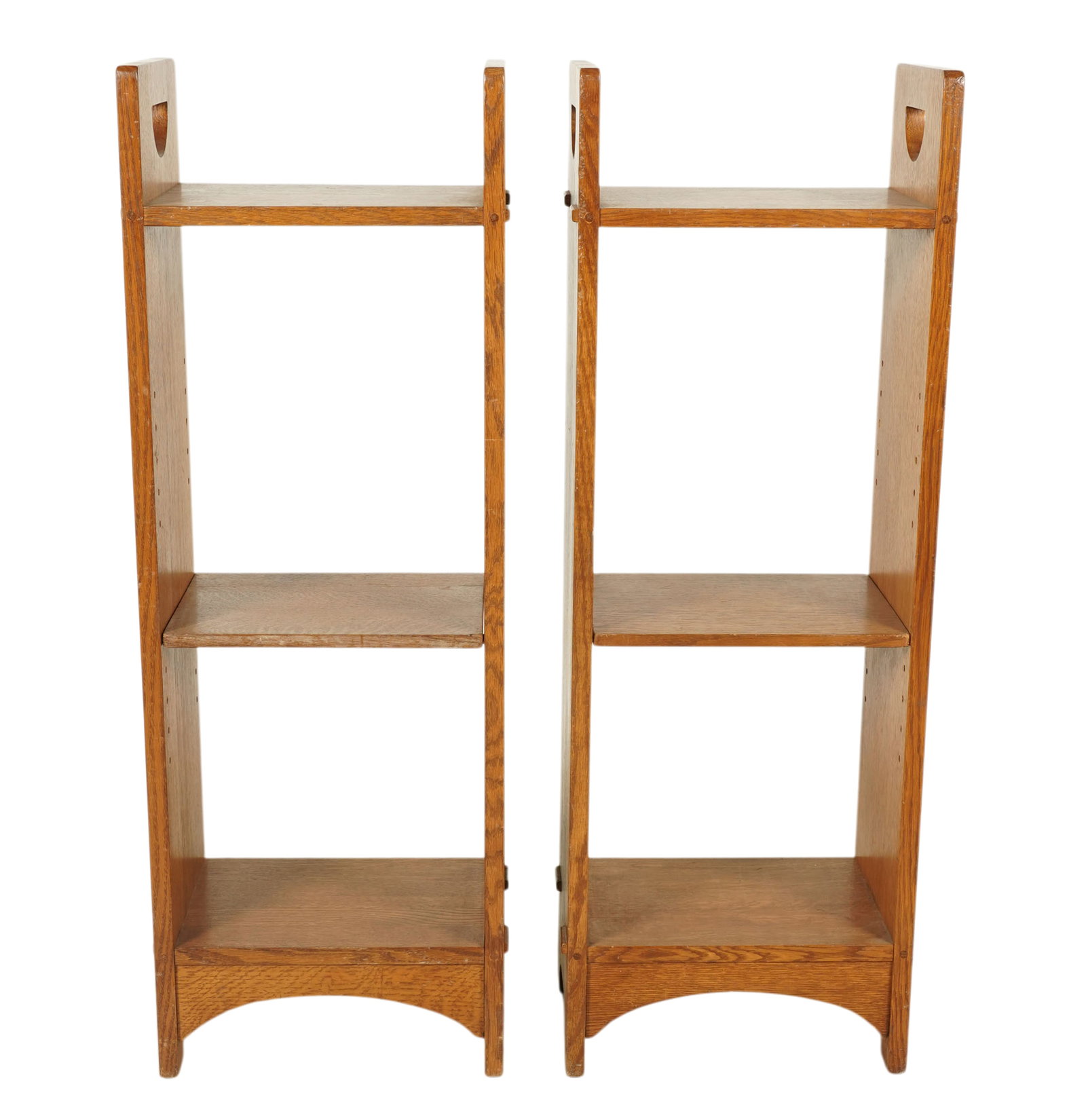 Pair of Stickley Oak Bookshelves: late 20th/ 21st century, with manufacturer's labels. 40 1/4 x 14 x 10 in.