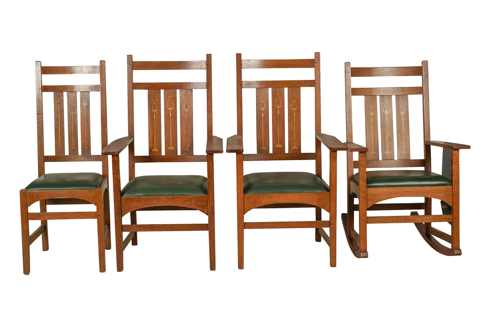 Four Stickley Oak Chairs: late 20th/21st century, with manufacturer's labels, two armchairs, a side chair, and a rocking chair