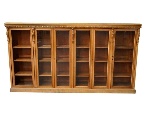 Blonde Oak Bookcase: with six doors enclosing adjustable shelving, 60 x 110 x 16 in.
