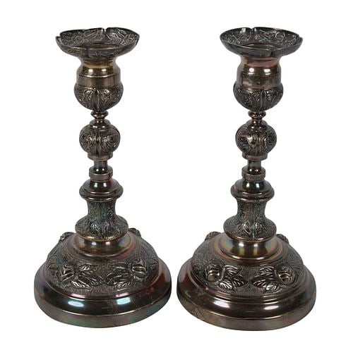 Pair of Sanborns Mexican Sterling Candlesticks: marked "Sanborns / Mexico / Sterling", approximately 595 grams total, each 7 1/4 in. high
