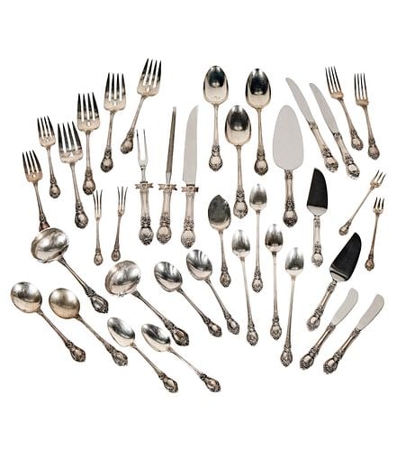 Oneida Heirloom Stanton Hall Sterling Flatware Service: Oneida Silversmiths, Sherrill, NY, comprising 13 stainless steel-bladed knives (8 7/8 in.), 12 stainless steel-bladed butter spreaders (6 1/4 in.), one stainless steel-bladed master butter knife (6 1/