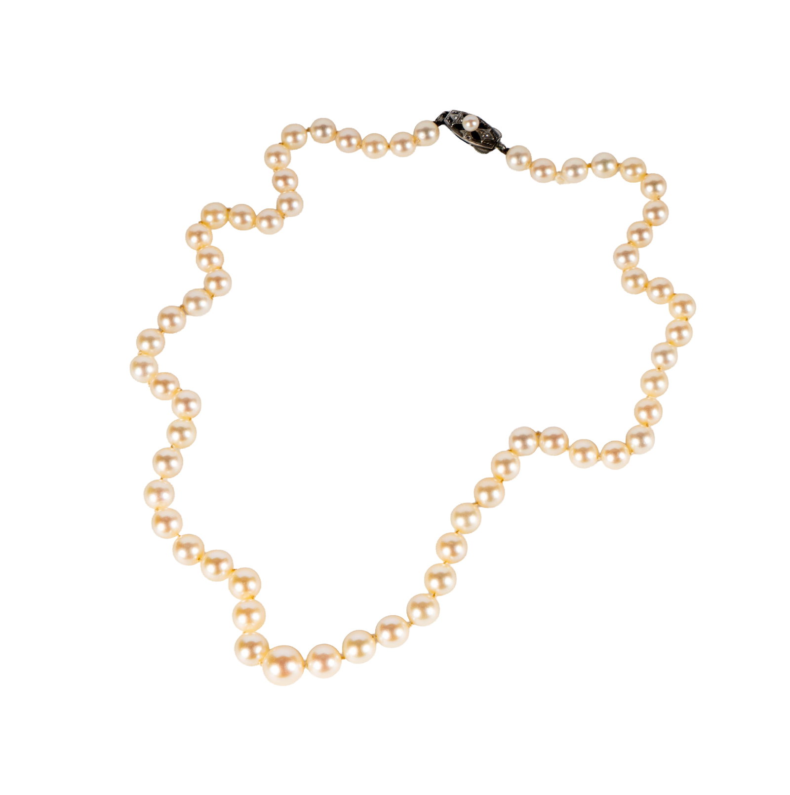 Sterling Silver Vintage Mikimoto Graduated Cultured Pearl Necklace: Including one mikimoto graduated pearl necklace, largest measuring 9.35mm and smallest measuring 6.50mm; necklace measuring 20-1/4 inches long, and weighing 32.7 grams; Provenance: The Los Angeles Est