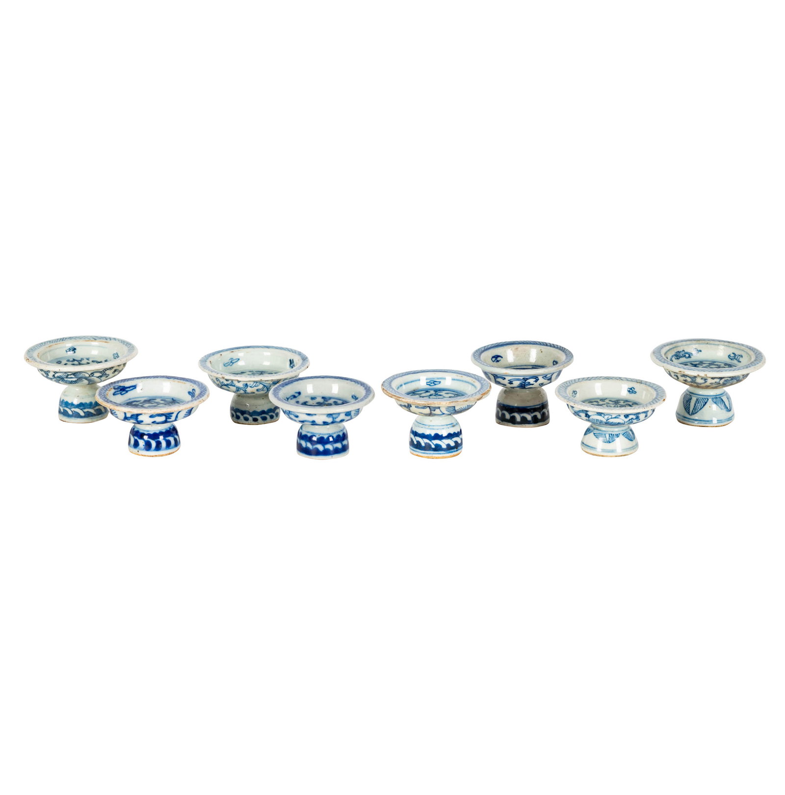 Group of Chinese Blue and White Candle Stands: unmarked, each 2 1/2 in. (6.4 cm.) high [8 pieces], Provenance: The Los Angeles Estate of Otto and Gail Natzler, the personal residence of Otto and Gertrud Natzler Los Angeles
