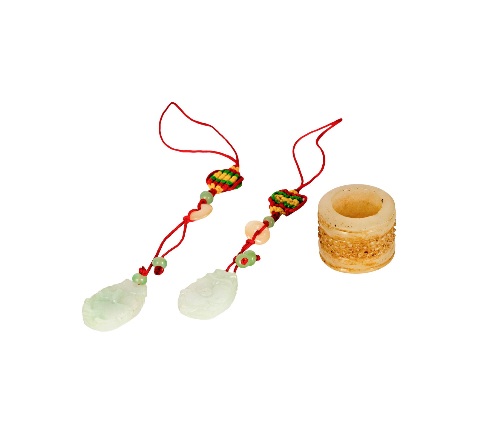 Three Chinese Jade Carvings: , Provenance: The Los Angeles Estate of Otto and Gail Natzler, the personal residence of Otto and Gertrud Natzler Los Angeles