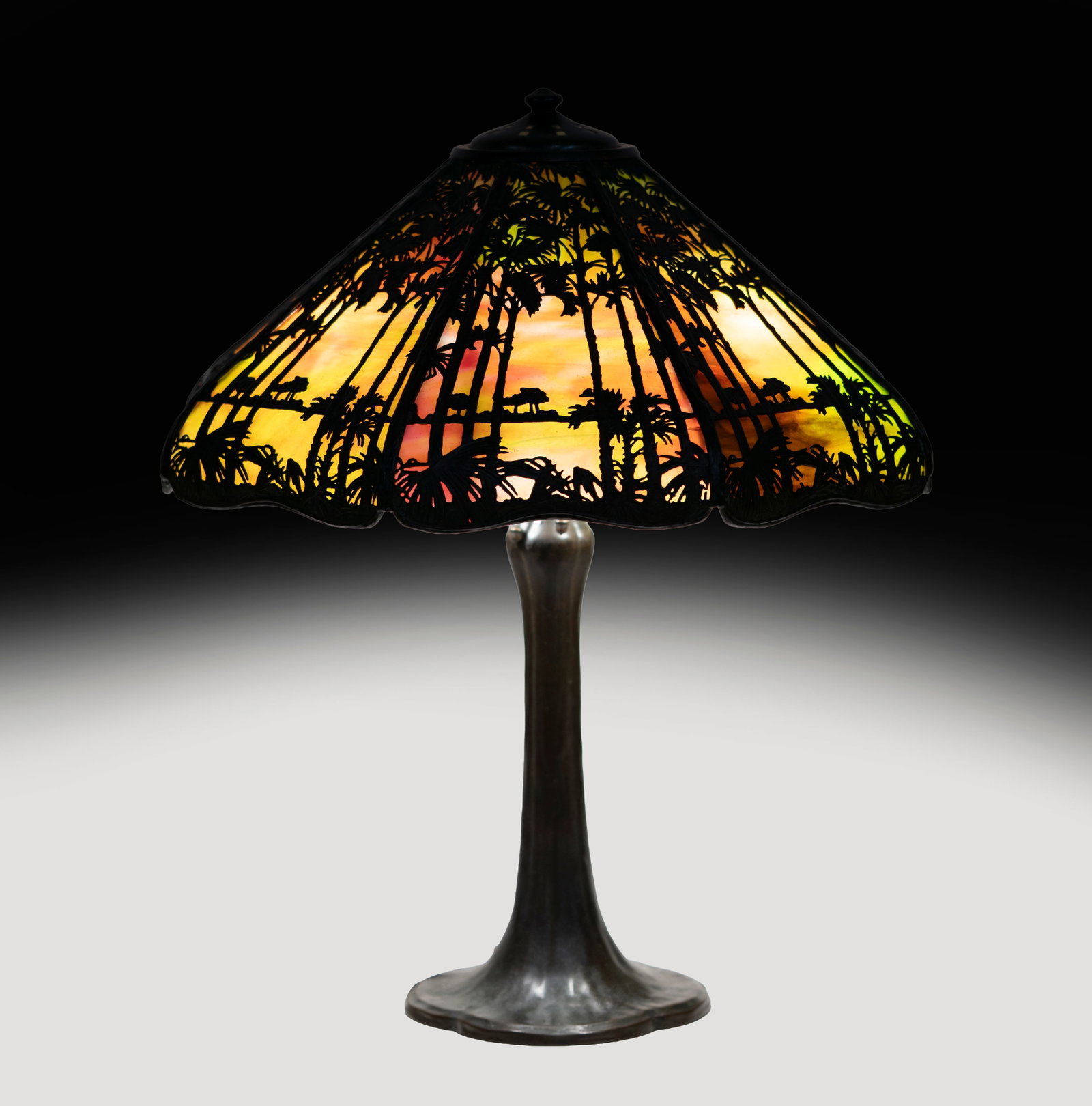 Handel Sunset Palm Table Lamp: signed to top of shade, overall: 24 x 19 in., Provenance: The Estate of Legendary Music Producer Richard Perry, Los Angeles, CA
